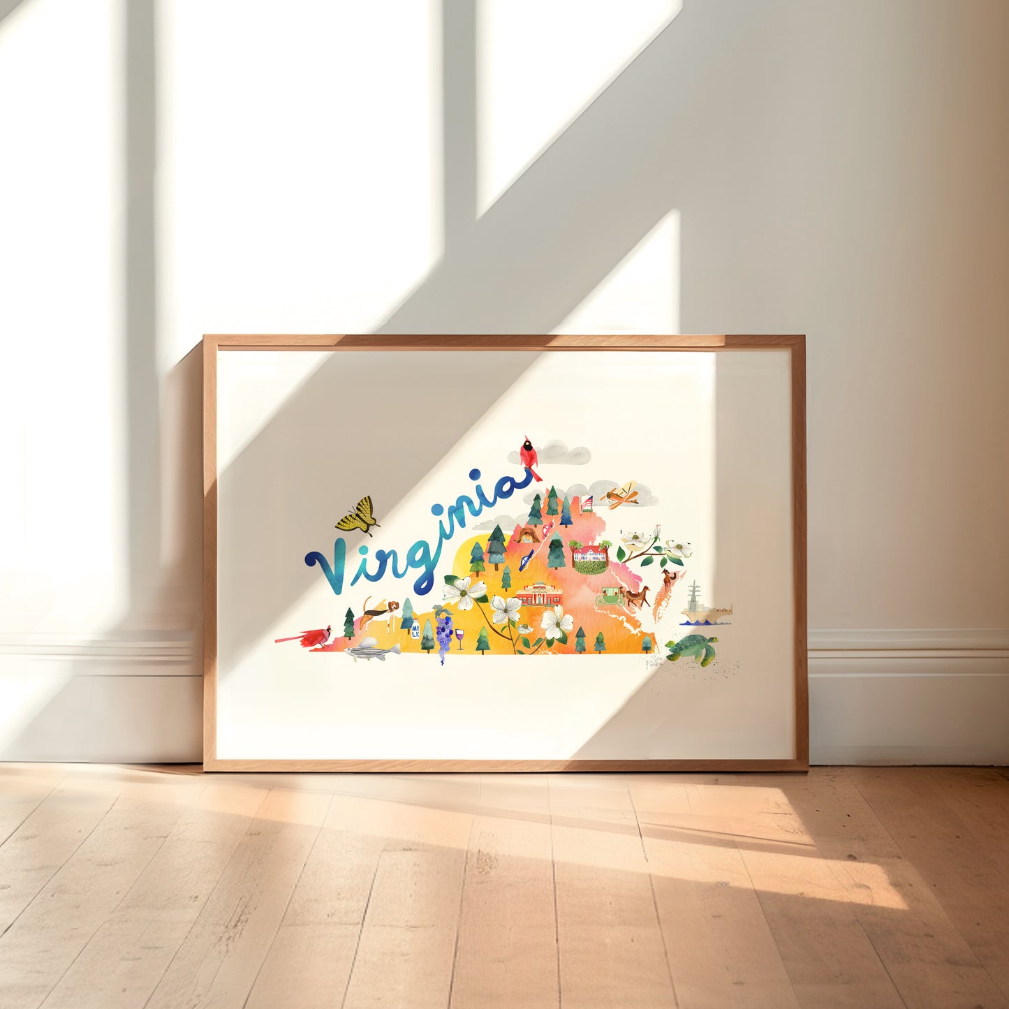 a picture frame sitting on a wooden floor