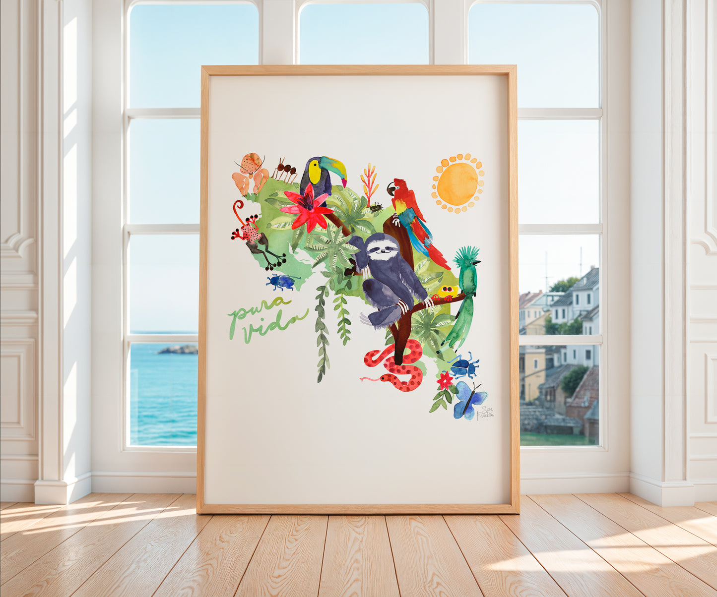 a picture frame with a picture of a tropical bird