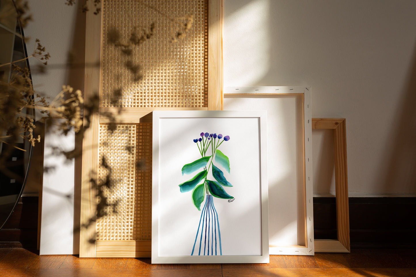 a picture of a vase with flowers on a table