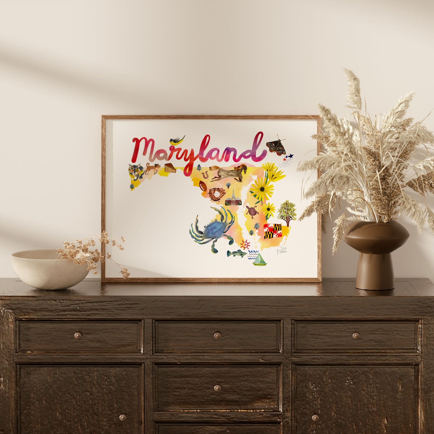 a wooden dresser topped with a vase filled with flowers