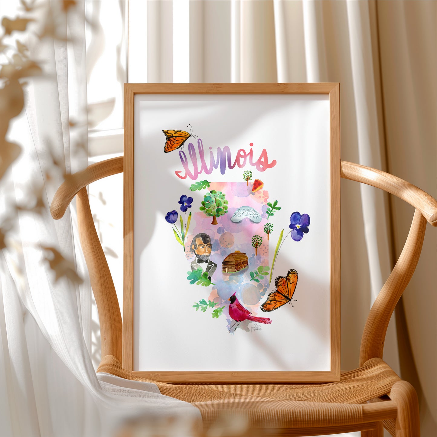 a wooden chair with a picture frame on it