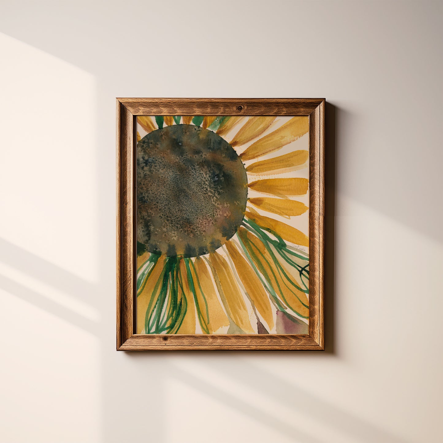 a framed painting of a sunflower on a wall.