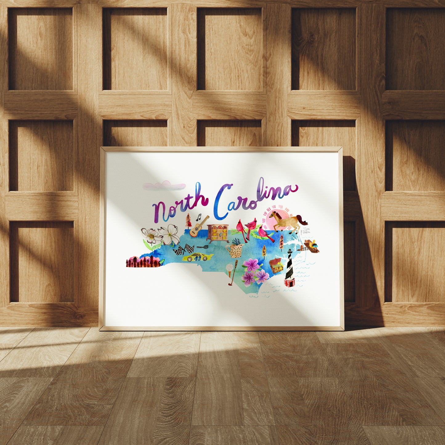 a picture of north carolina on a wood paneled wall