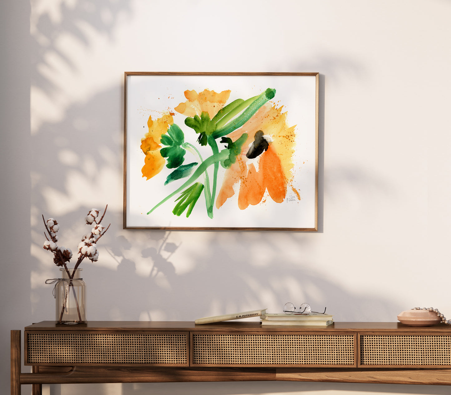 a painting hanging on a wall above a table