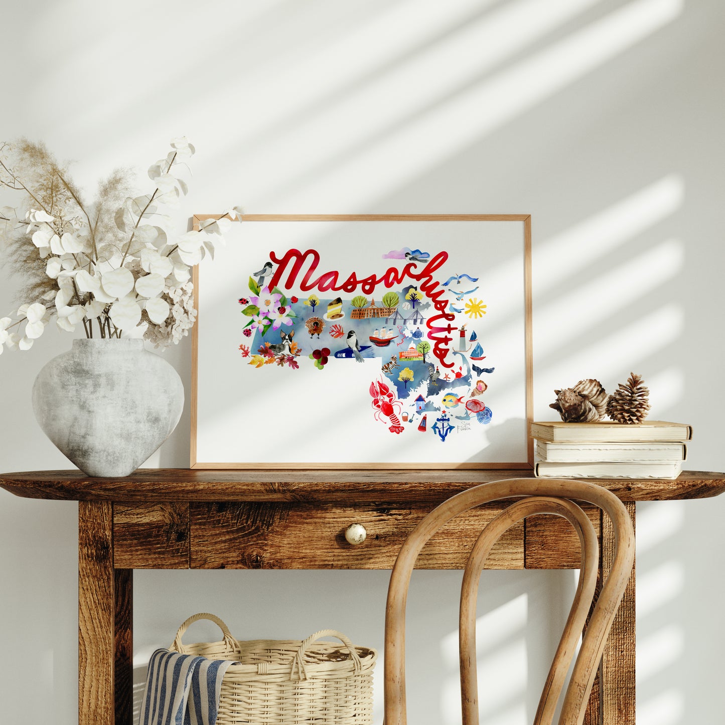 a wooden table with a vase of flowers on top of it