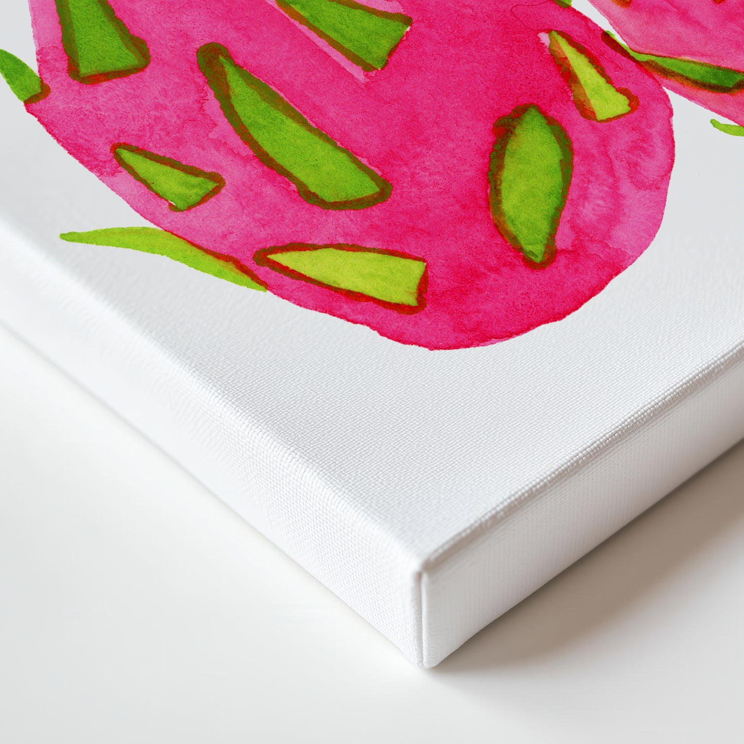 a close-up view of a vibrant pink dragon fruit, with its distinctive green and yellow accents.