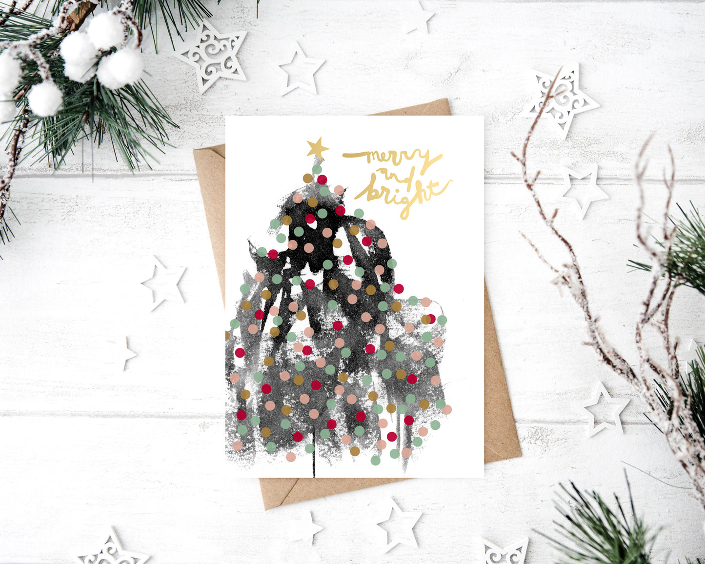 a christmas card with a picture of a couple hugging