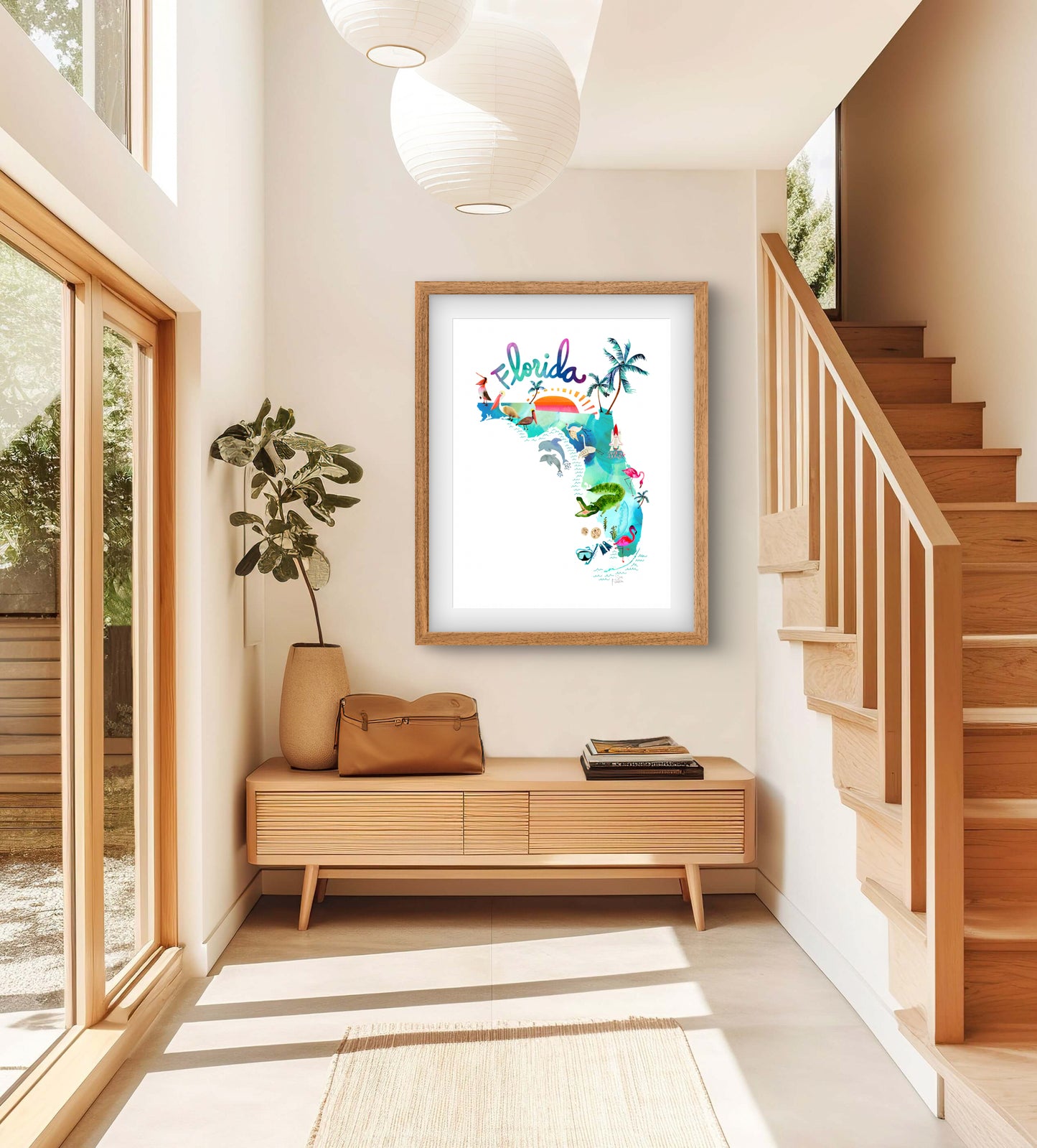 a framed picture of a giraffe in a living room