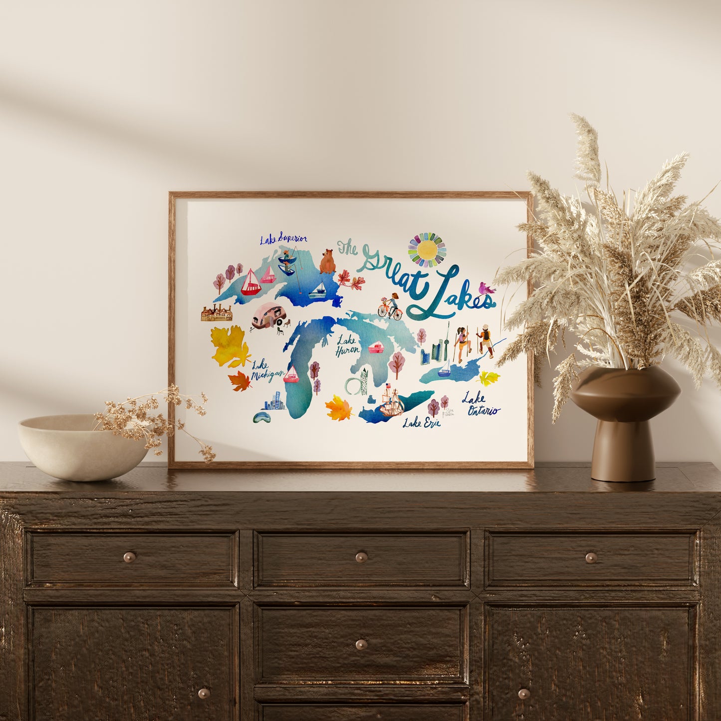 a wooden dresser with a vase of flowers on top of it