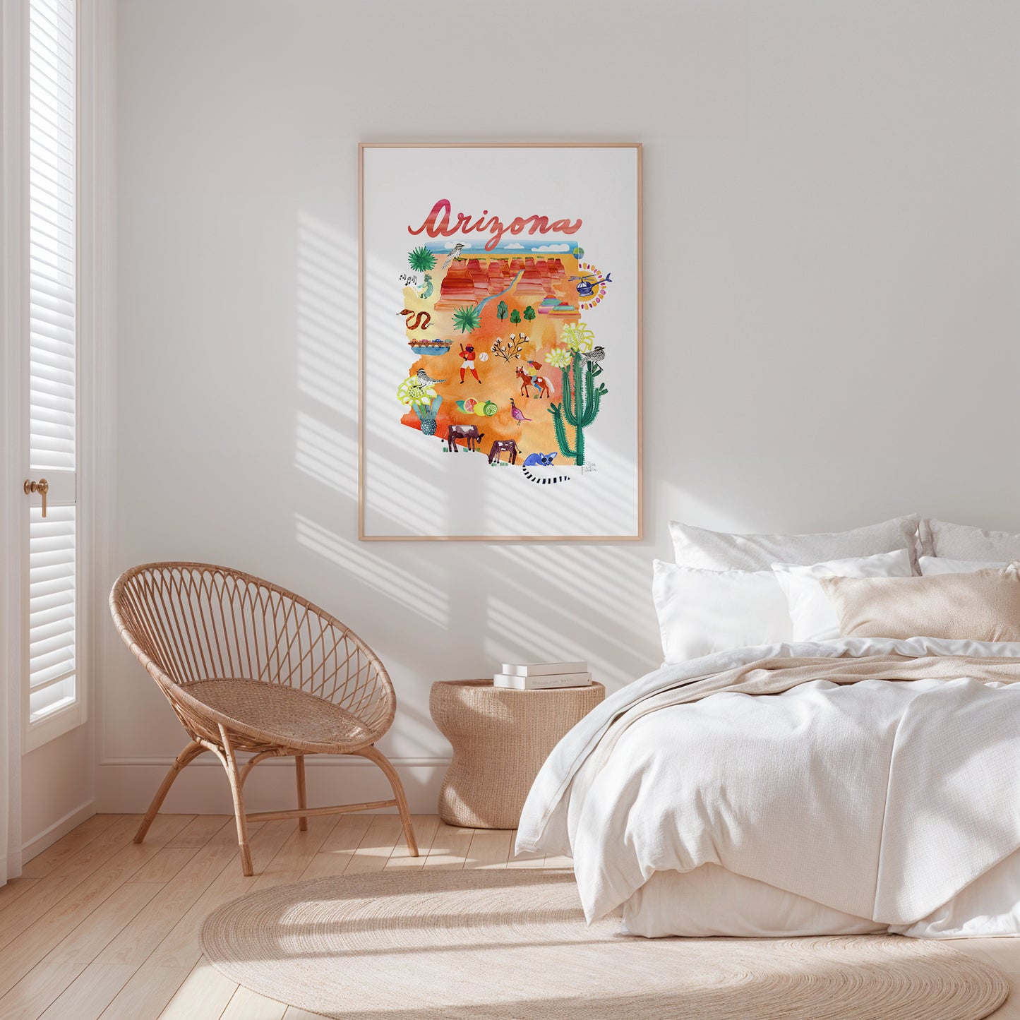 a bedroom with a white bed and a white chair