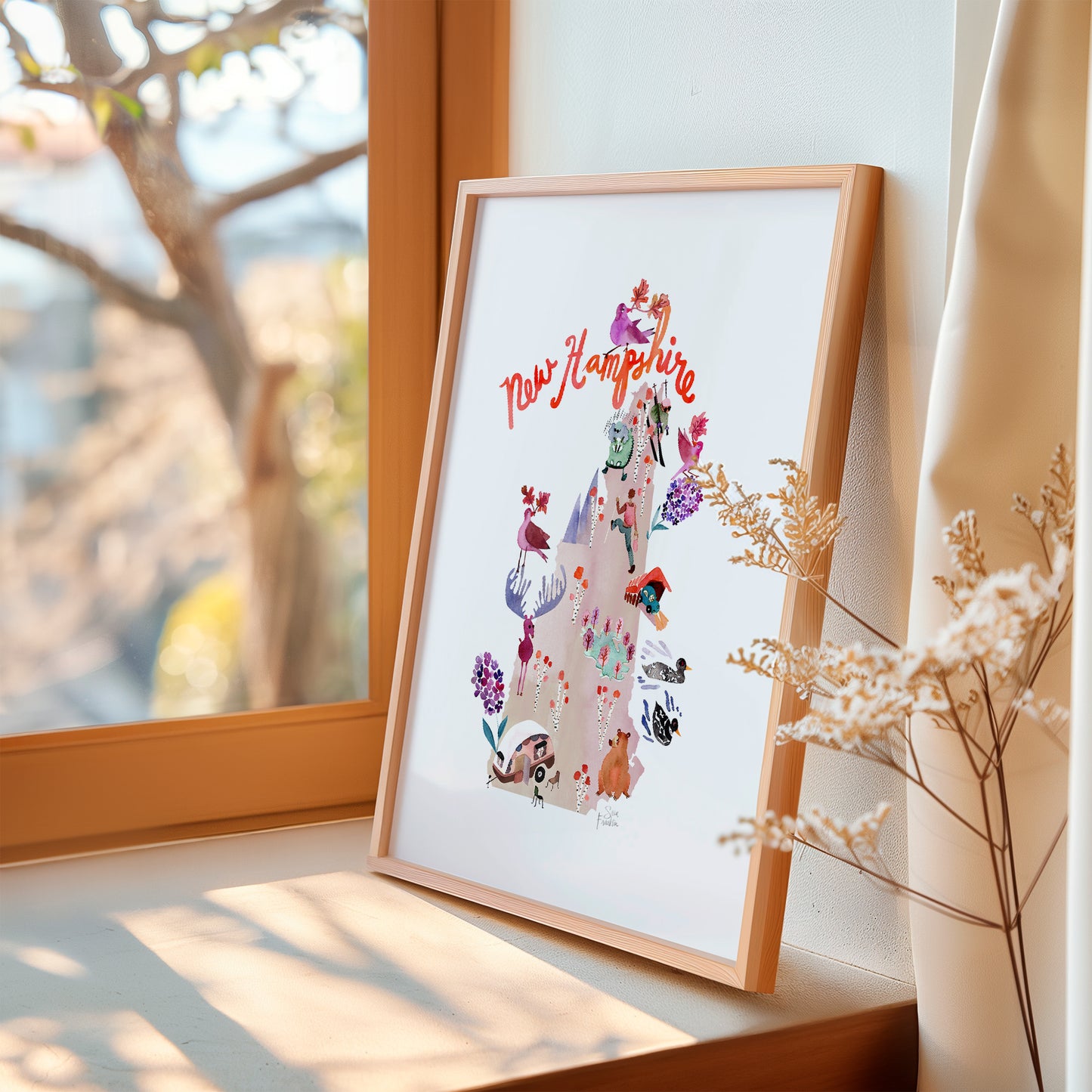 a picture of a cat on a window sill