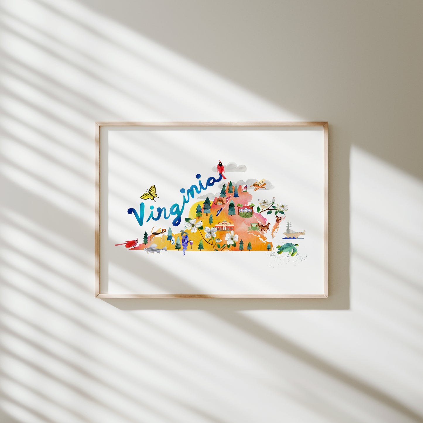 a picture hanging on a wall with the word virginia painted on it