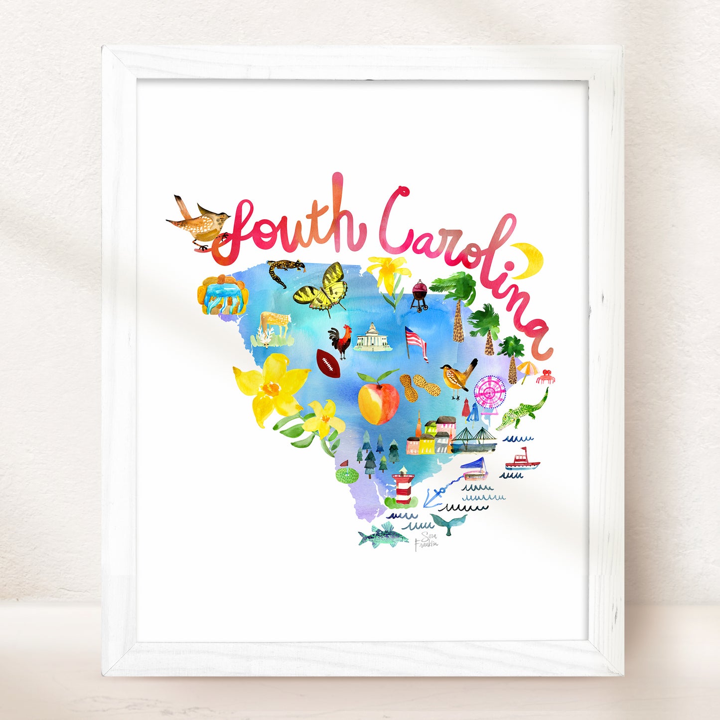 a white framed picture of a map of south carolina