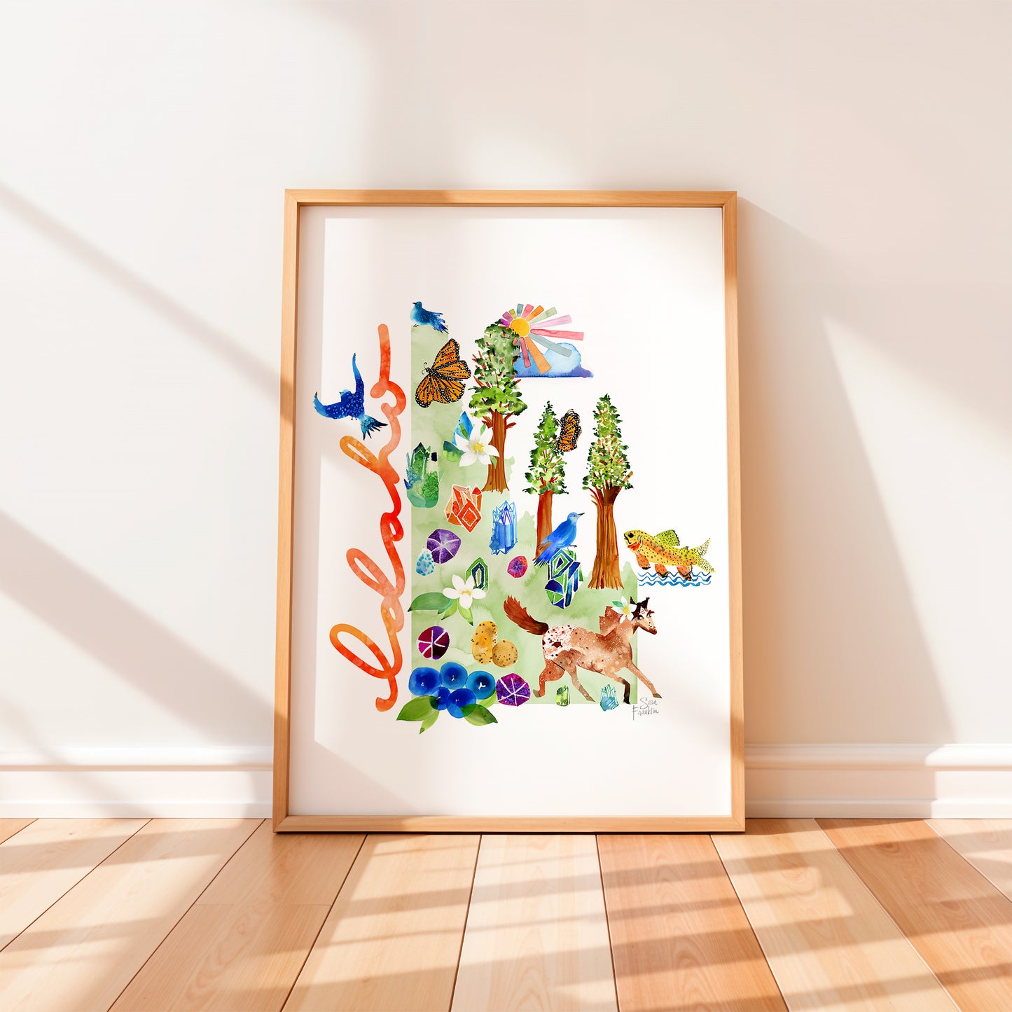 a picture of a wooden frame with a picture of a forest
