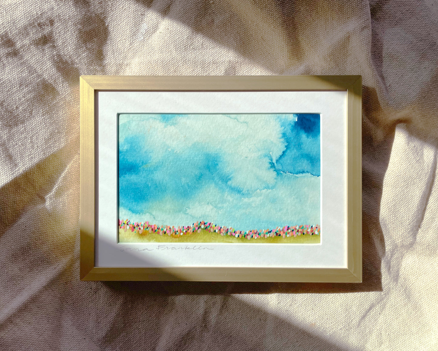 a painting of a blue sky with clouds