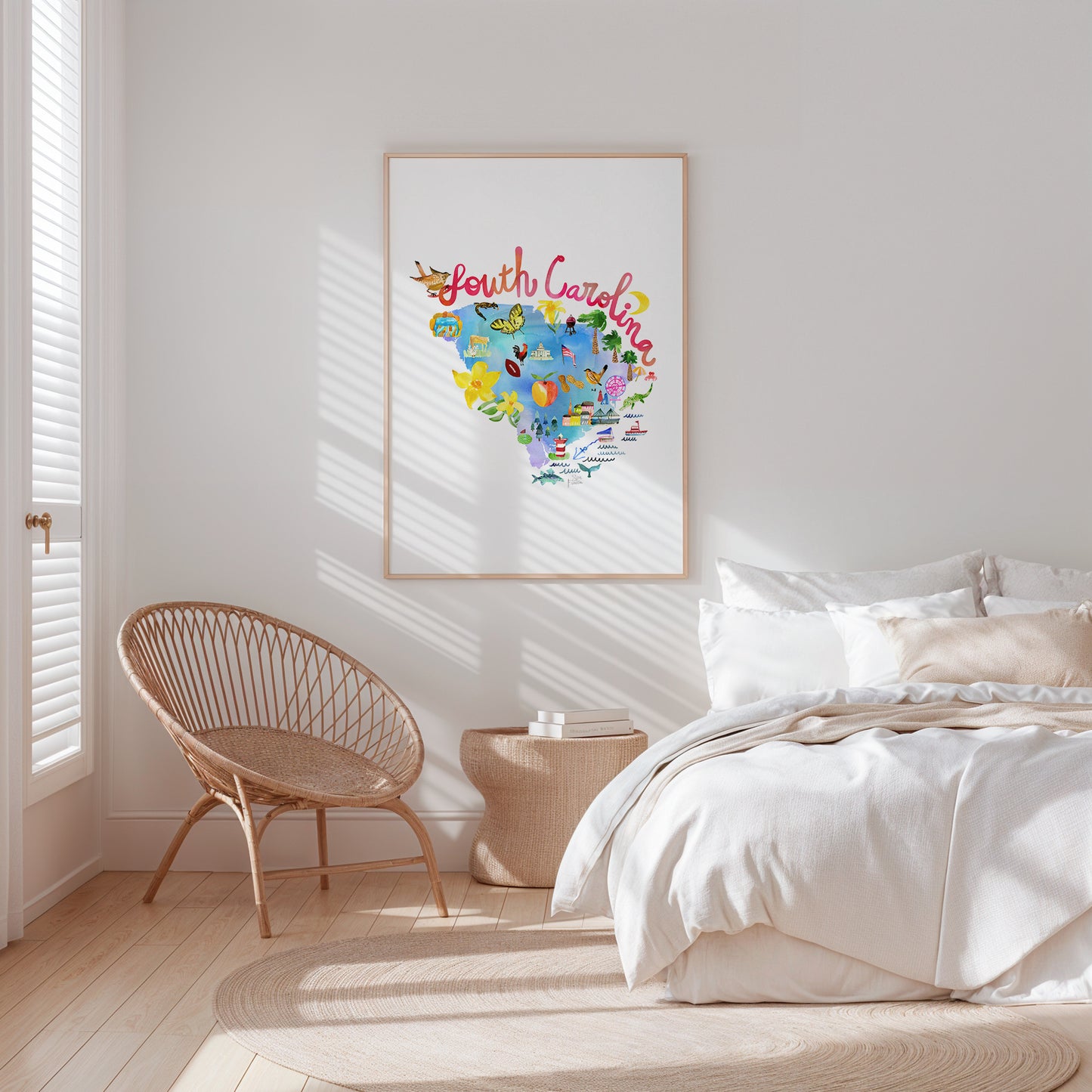a bedroom with a bed, chair and a picture on the wall