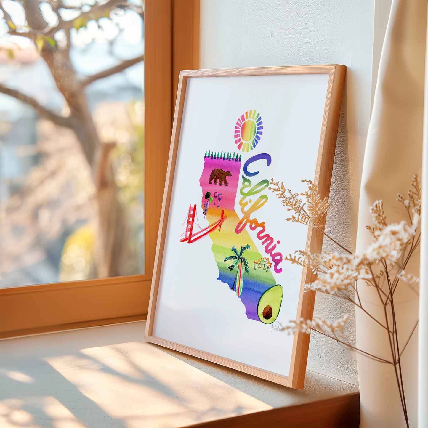 a picture of a child's drawing on a window sill