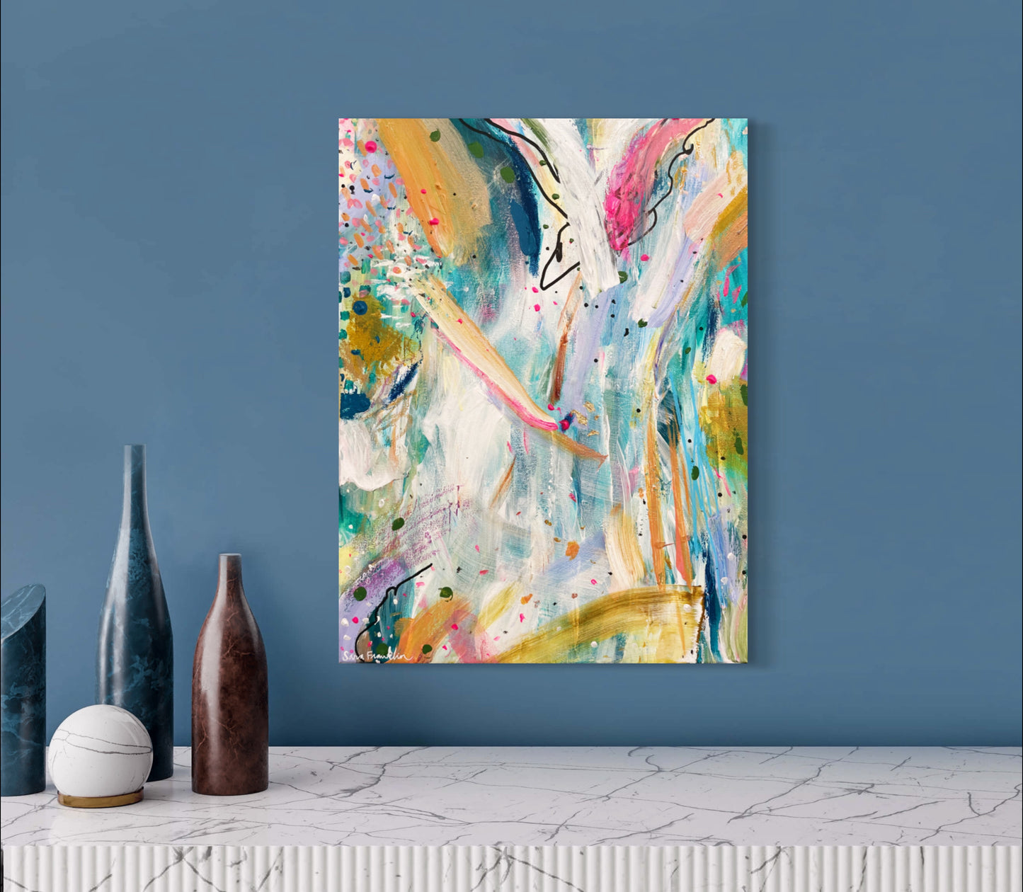 a painting hanging on a wall next to vases