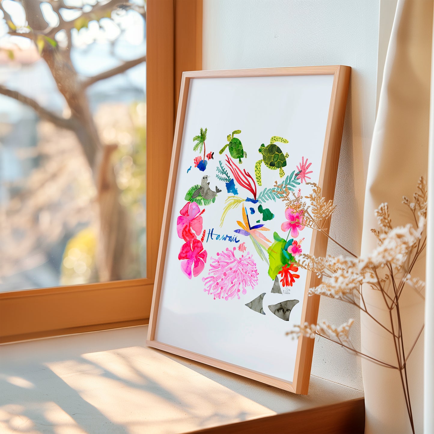 a picture frame with a picture of flowers on it next to a window