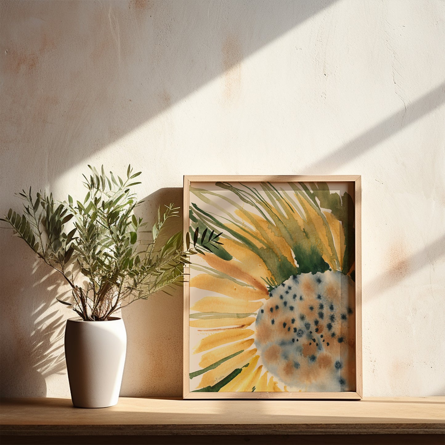 a white vase with a plant on a wooden shelf, accompanied by a framed watercolor painting of a sunflower.