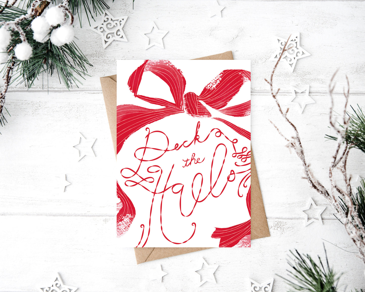 a christmas card with a red bow on it
