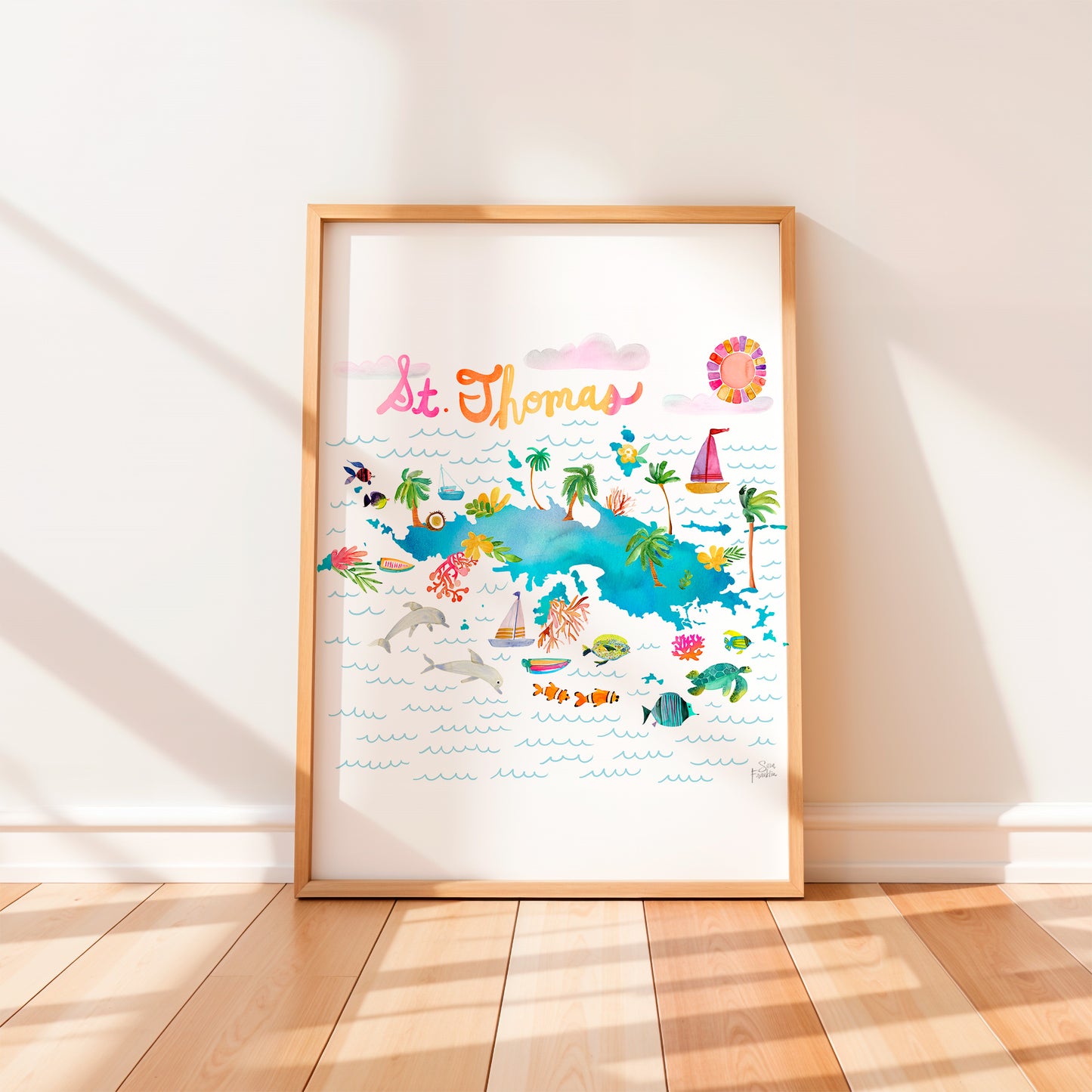 a picture frame with a picture of a tropical island