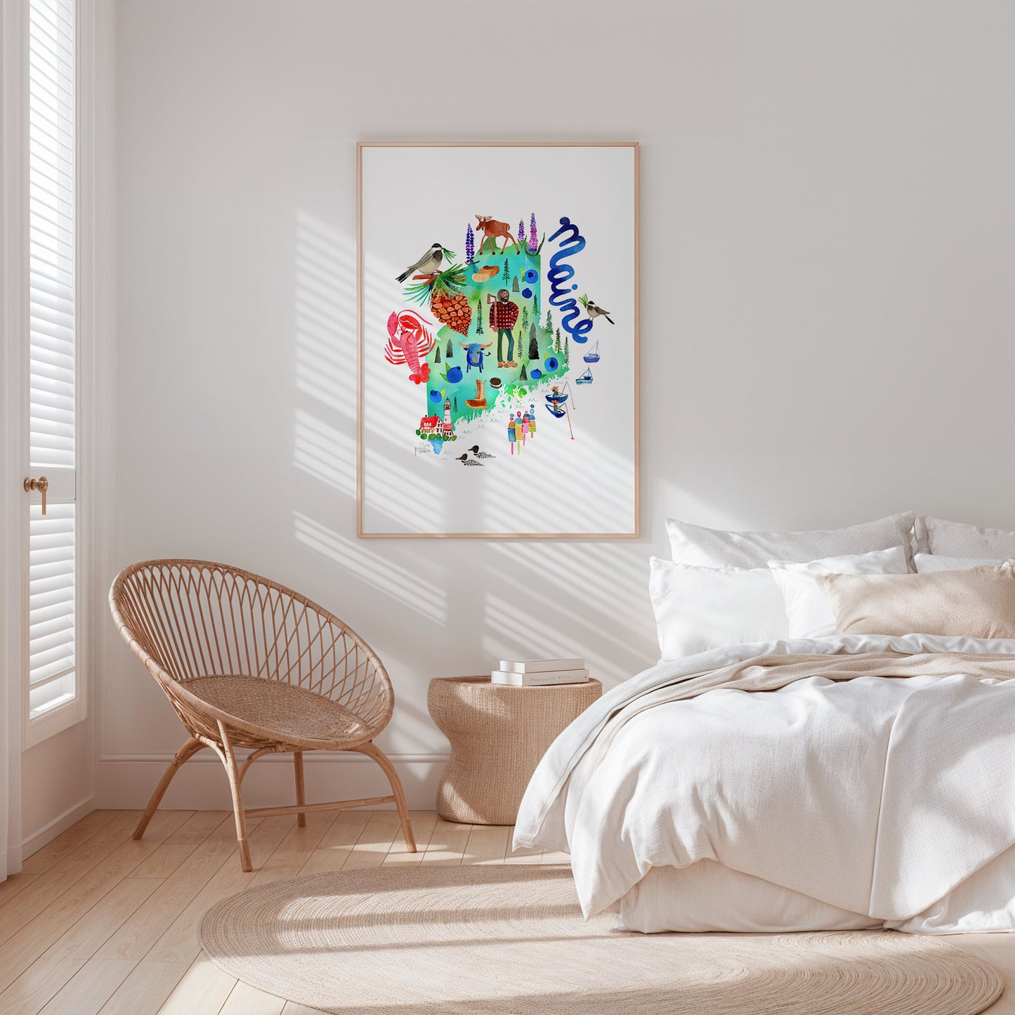 a bedroom with a bed, chair and a picture on the wall