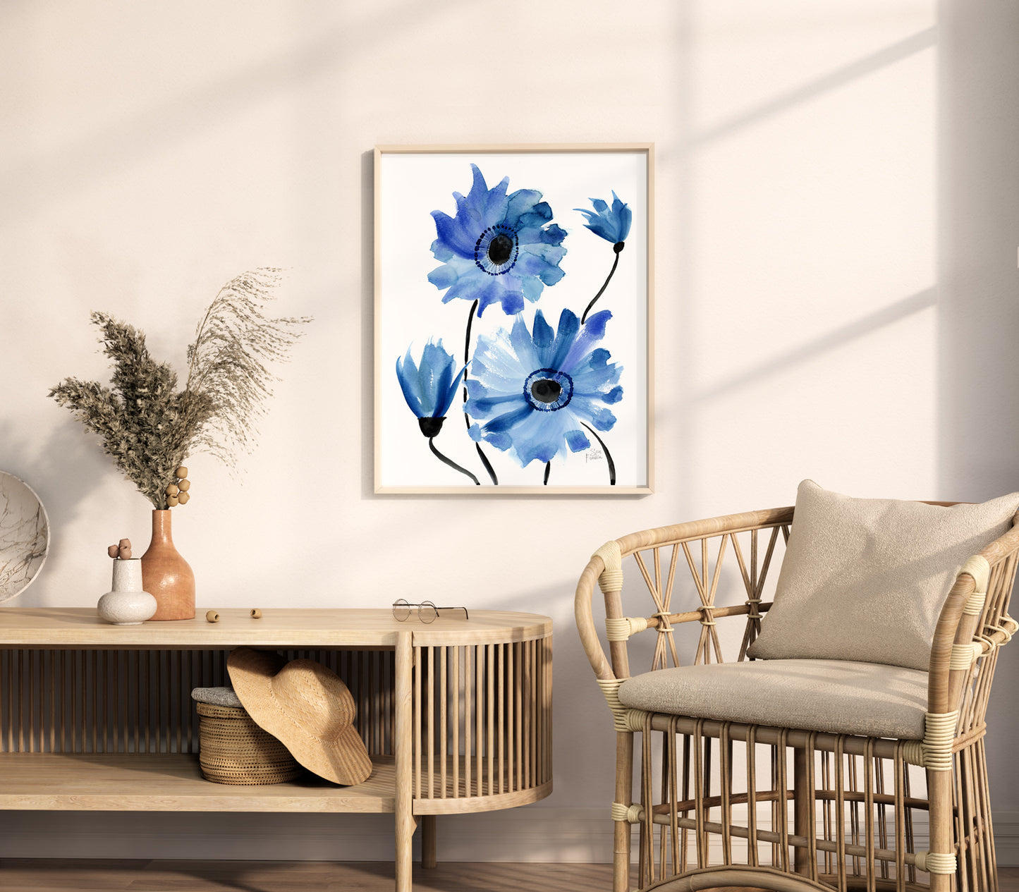 a painting of blue flowers on a white wall