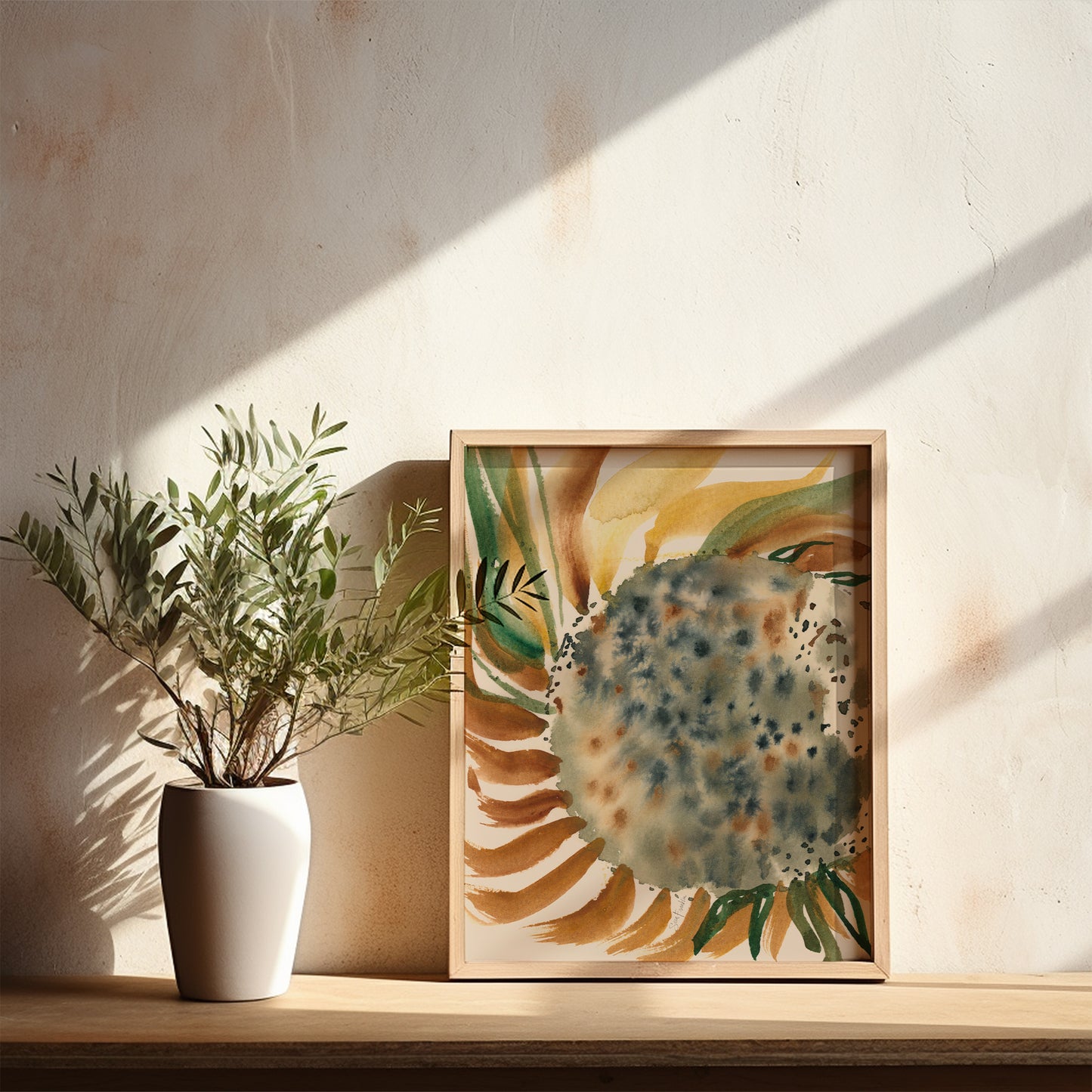 a white vase with a plant on a wooden shelf, accompanied by a framed painting of a sunflower.