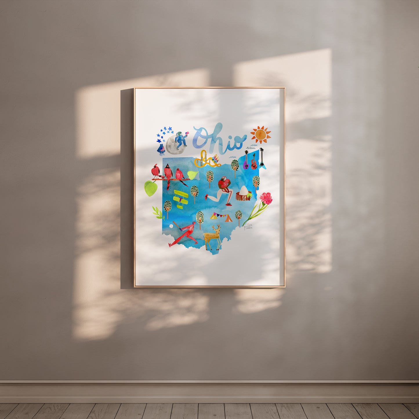 a picture hanging on a wall in a room