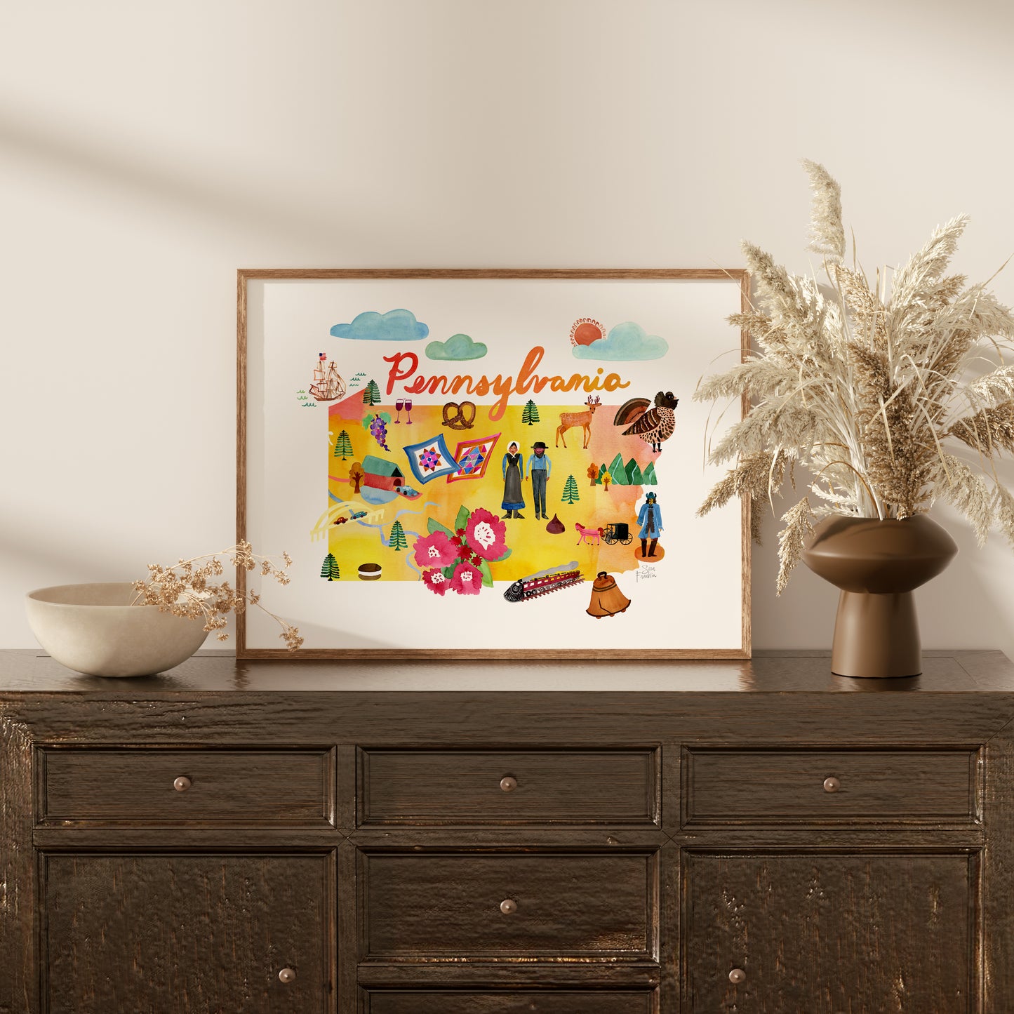 a picture of a painting on a wall above a dresser