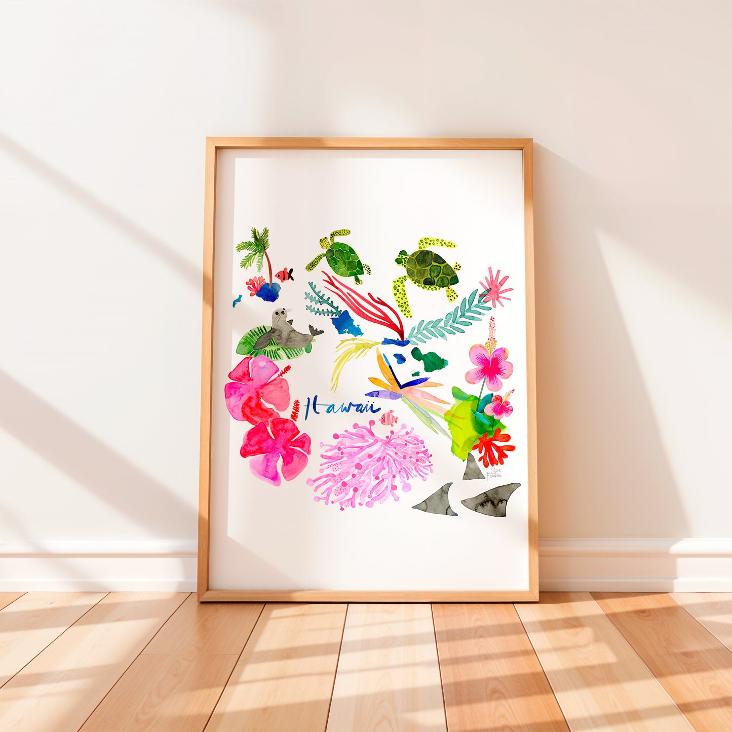 a picture frame with a picture of flowers and fish