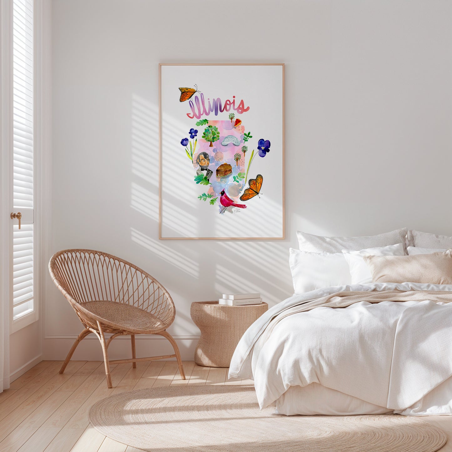 a bedroom with a bed, chair and a picture on the wall