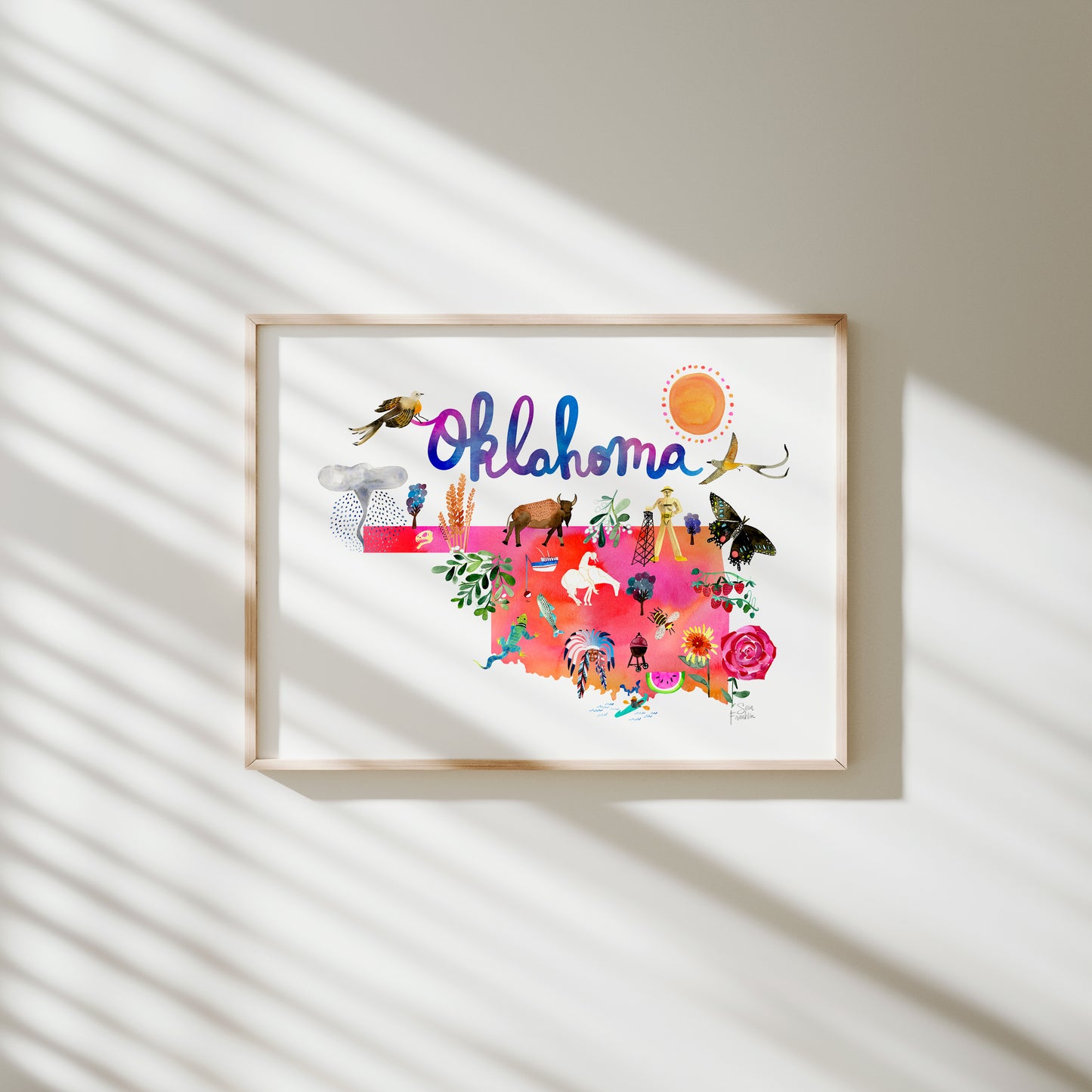 a picture hanging on a wall with the word oklahoma in it
