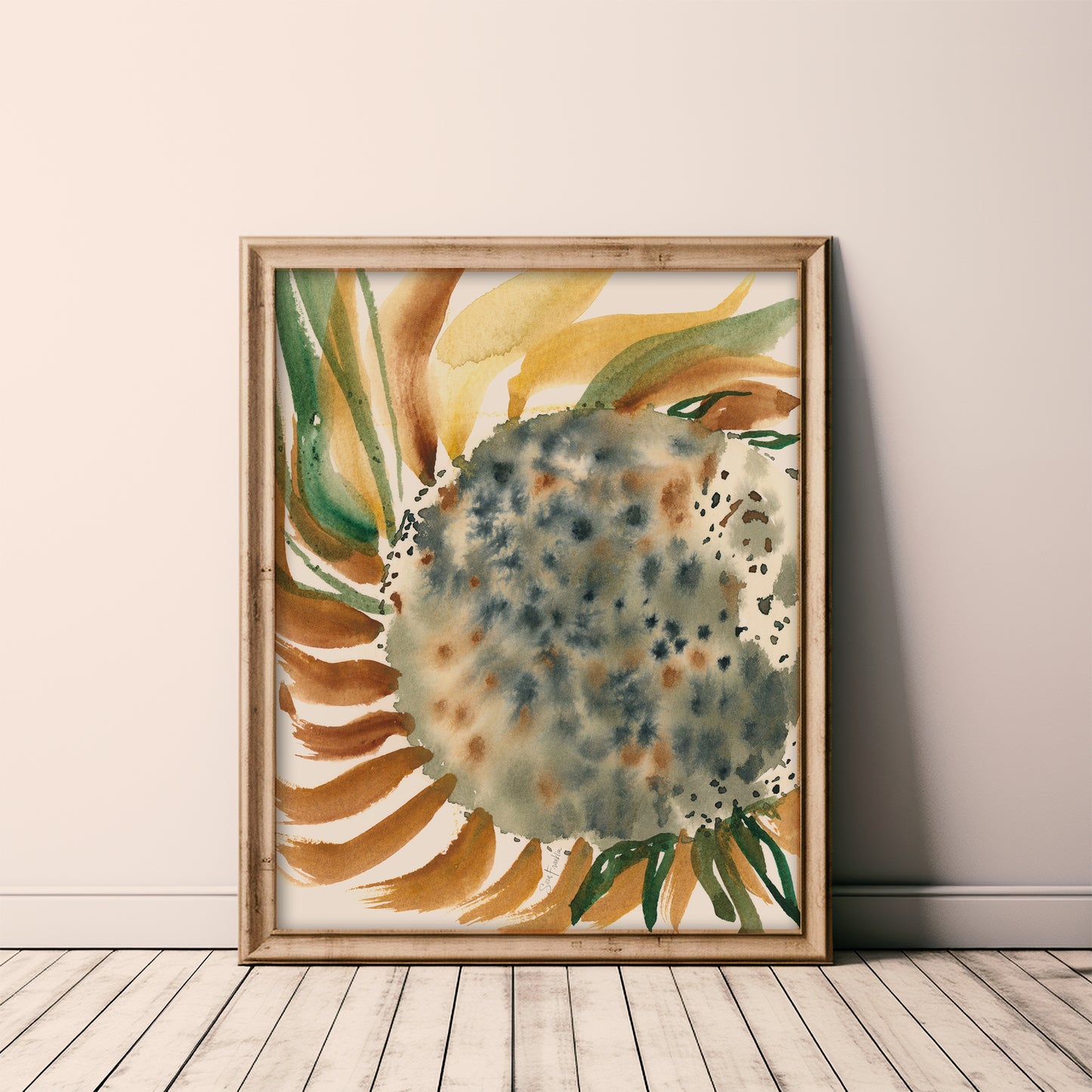 a framed watercolor painting of a sunflower with a mix of green, yellow, and brown colors.