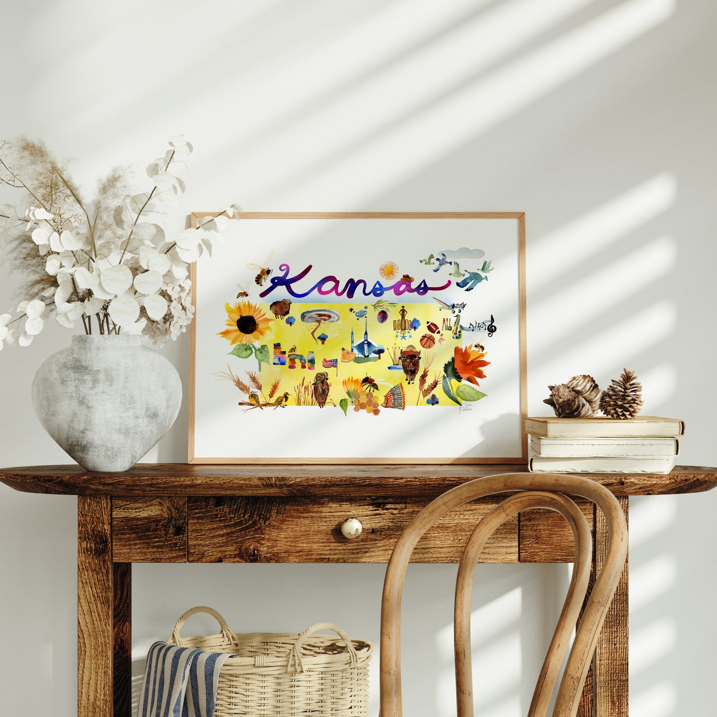 a wooden table with a vase of flowers on top of it