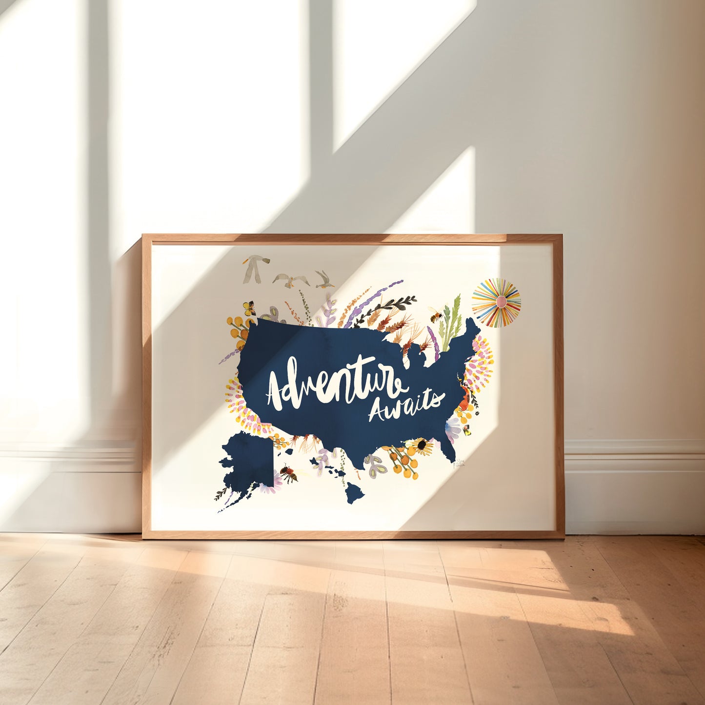 a picture frame sitting on top of a hard wood floor