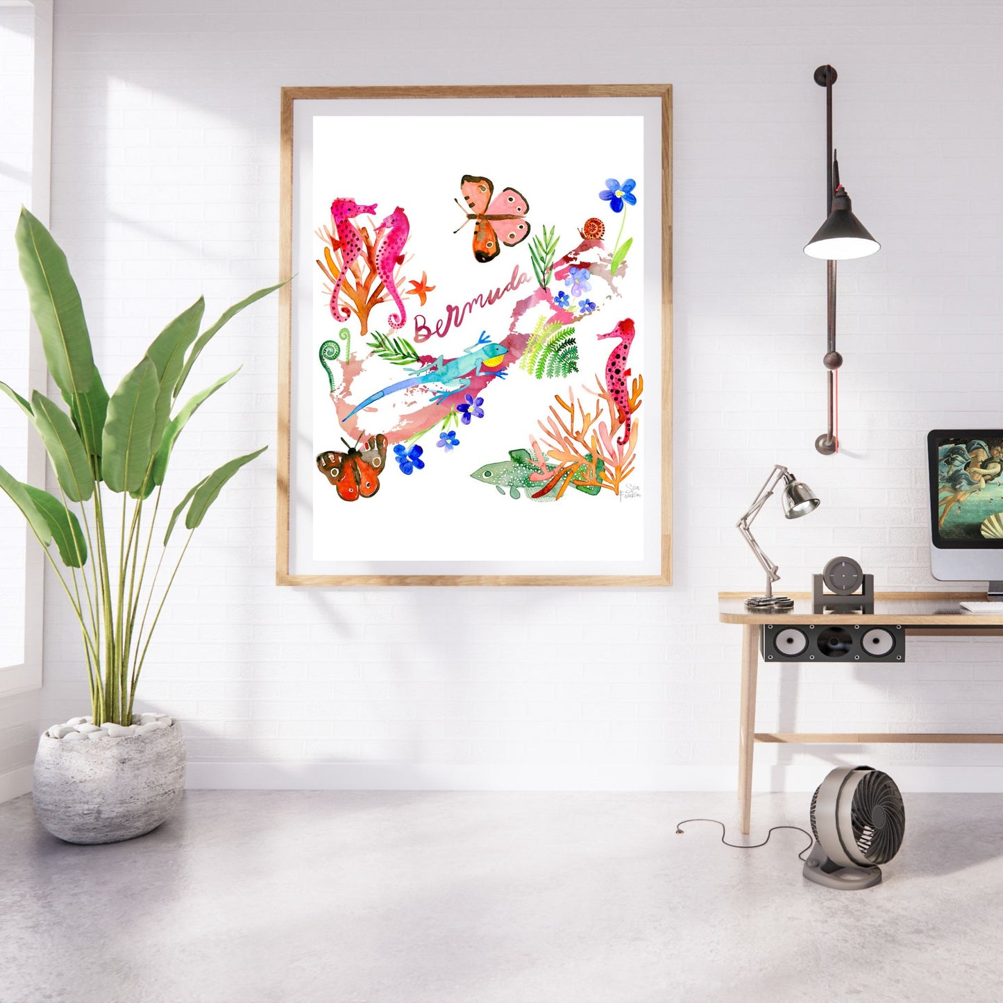a painting hanging on a wall in a room