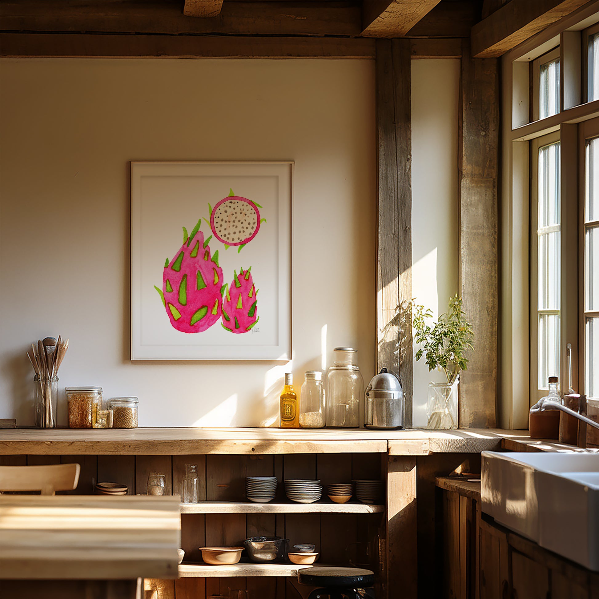 a kitchen with a wooden counter, a sink, and various kitchen items such as jars, bottles, and a vase. There is a framed illustration of a dragon fruit on the wall, and the kitchen appears to be well-lit and organized.