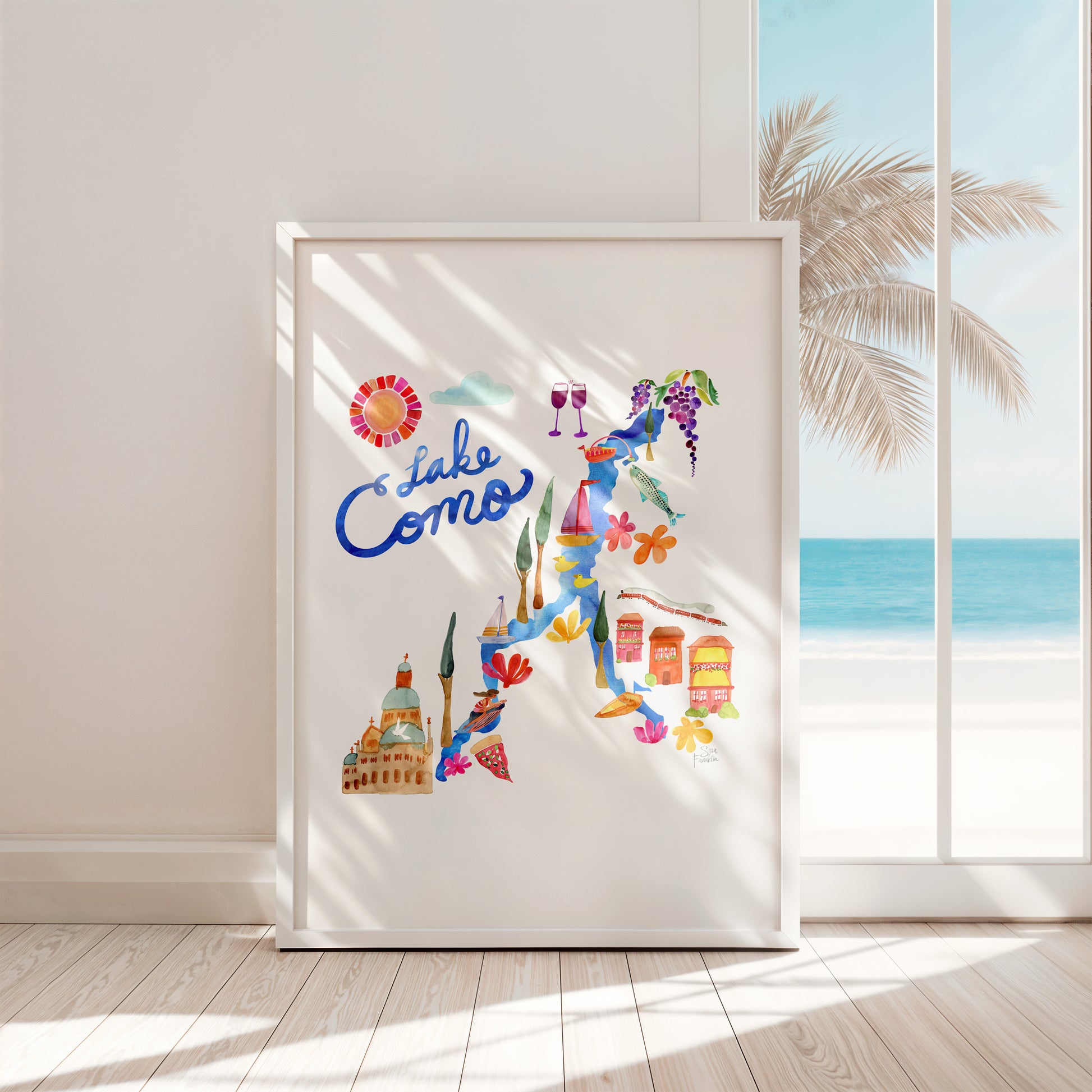 a picture of a window with a view of the beach
