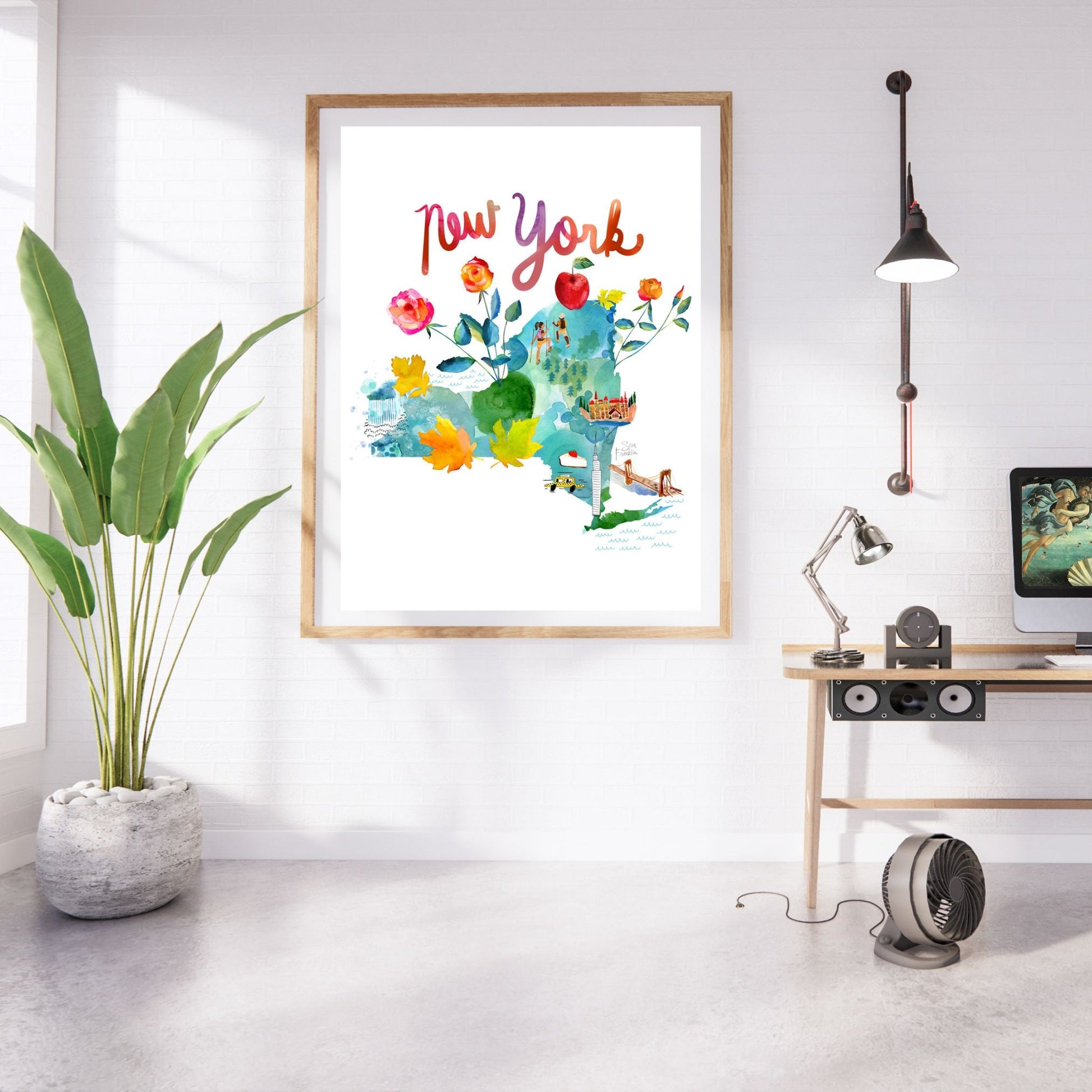 a picture hanging on a wall in a room