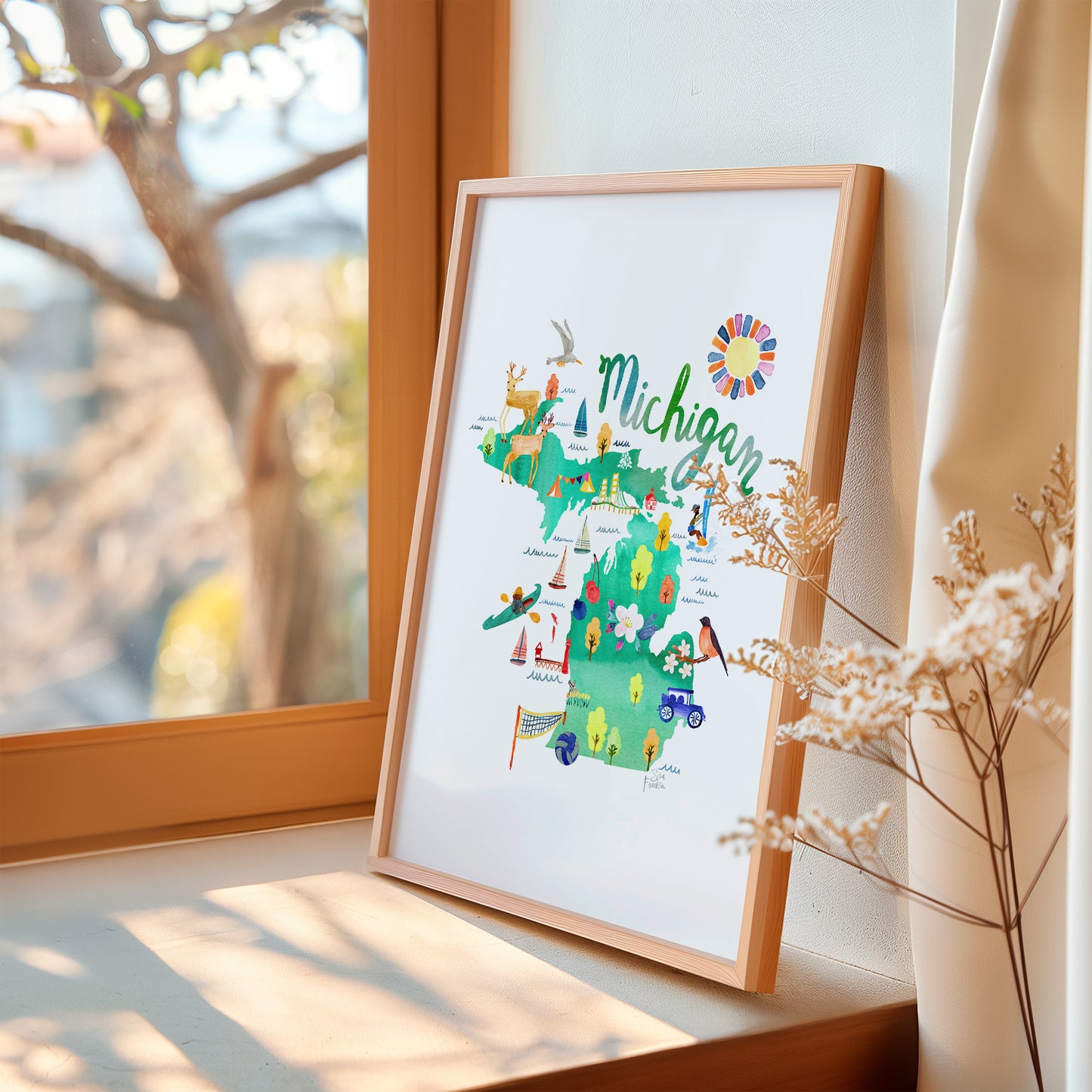 a picture of a map of michigan on a window sill