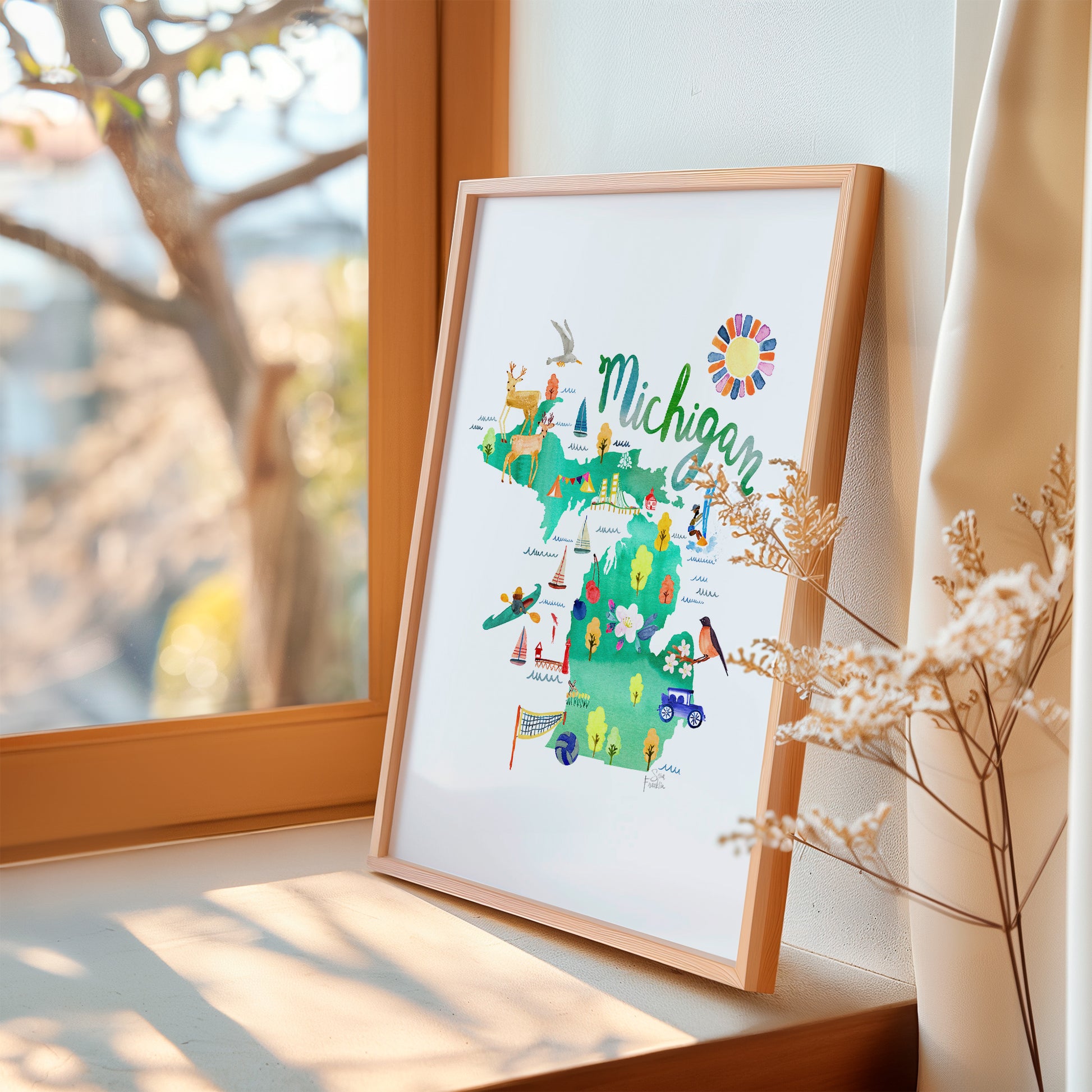 a picture of a map of michigan on a window sill
