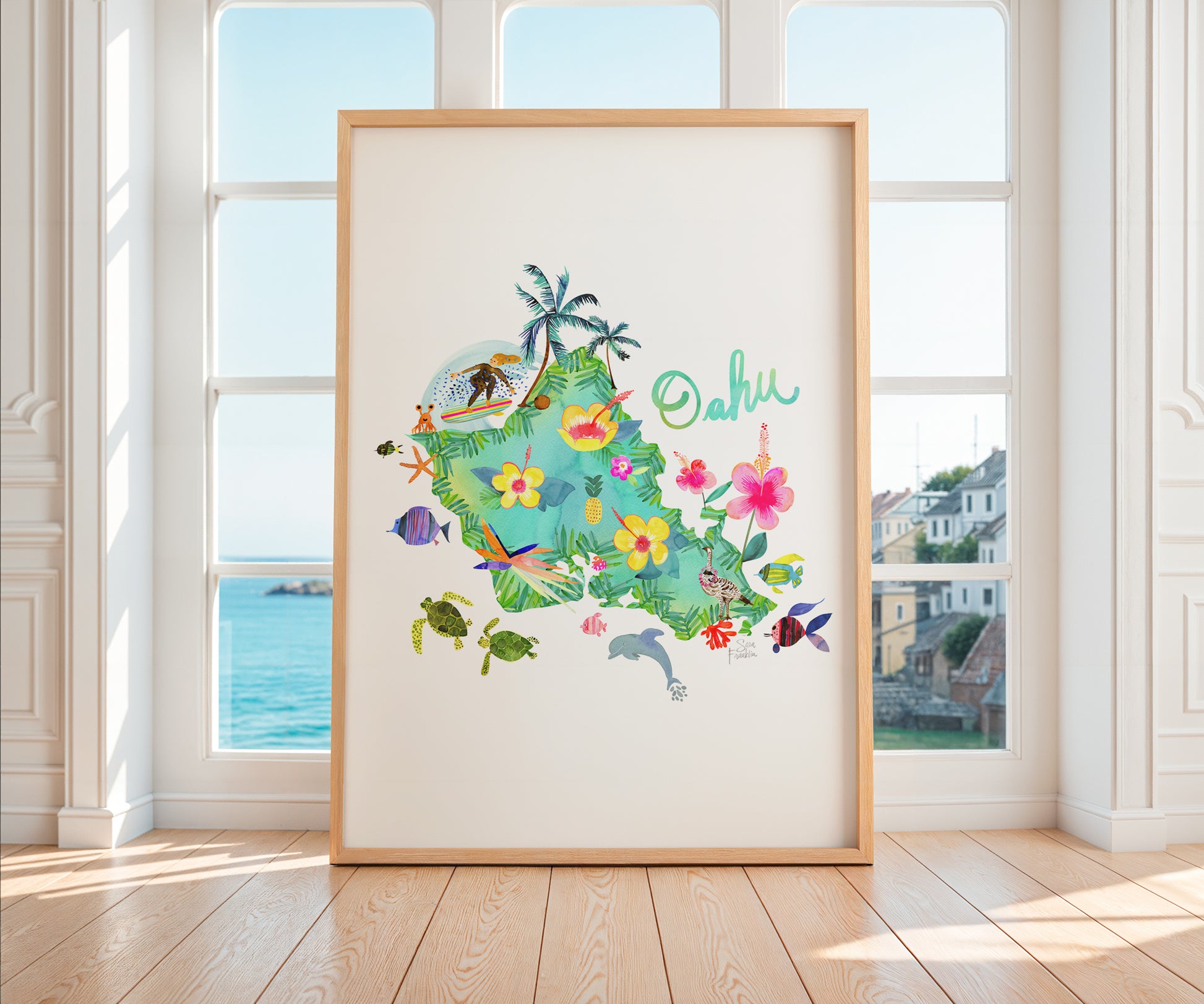 a picture frame with a picture of a tropical island