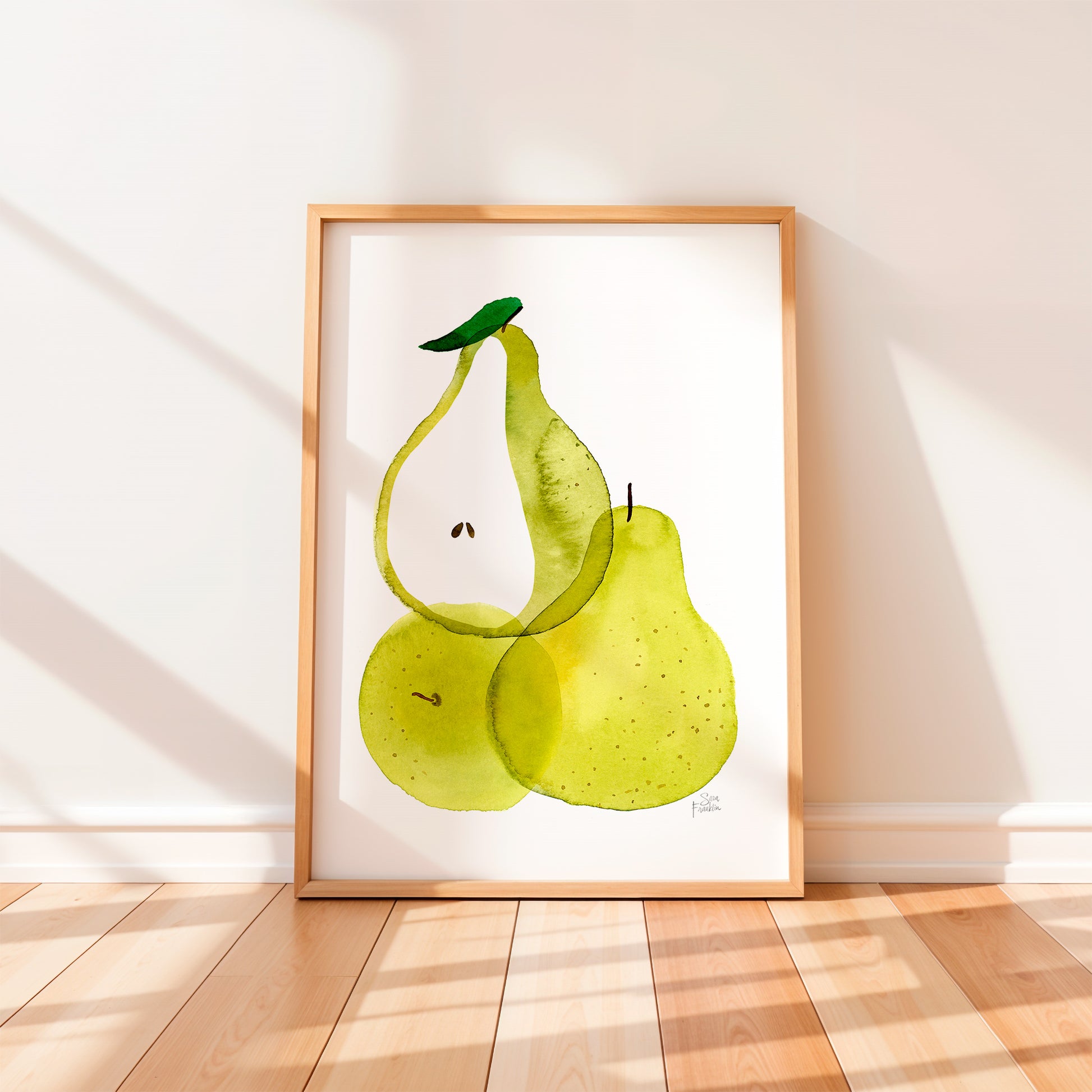 a framed painting of two green pears on a white background.