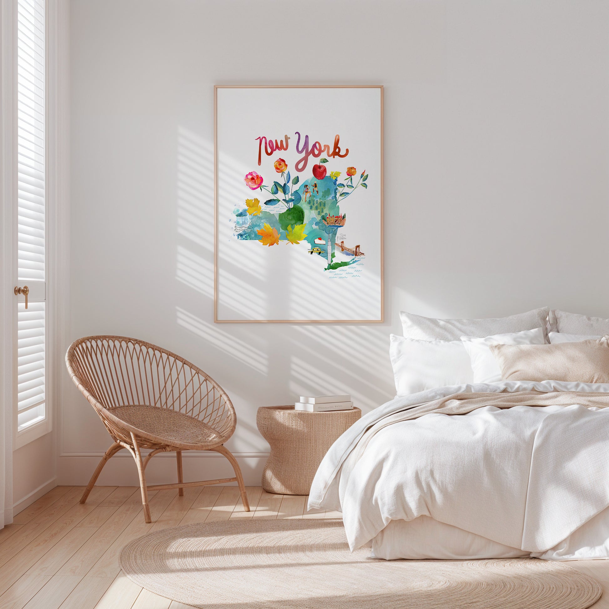 a bedroom with a white bed and a white chair