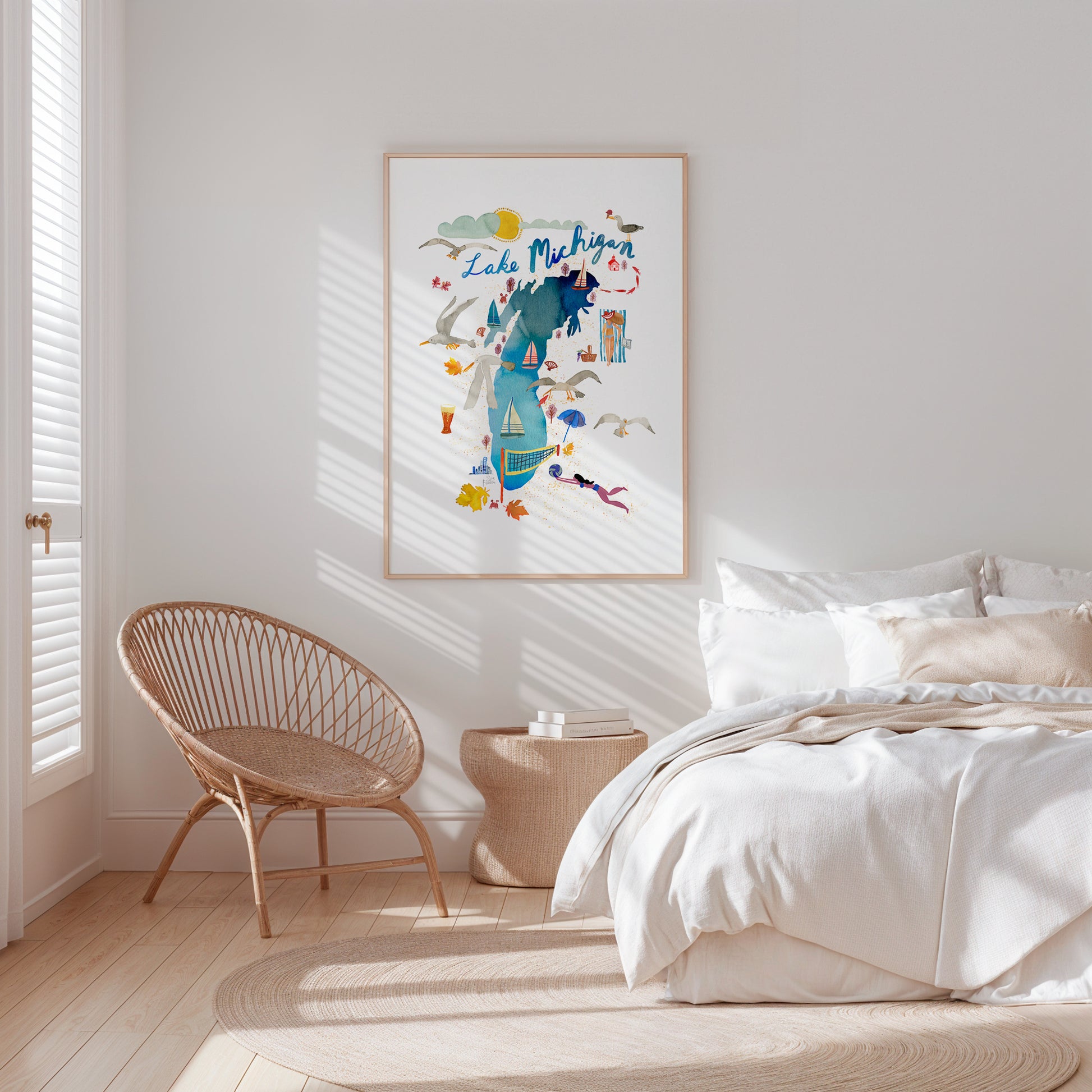 a bedroom with a bed, chair and a picture on the wall