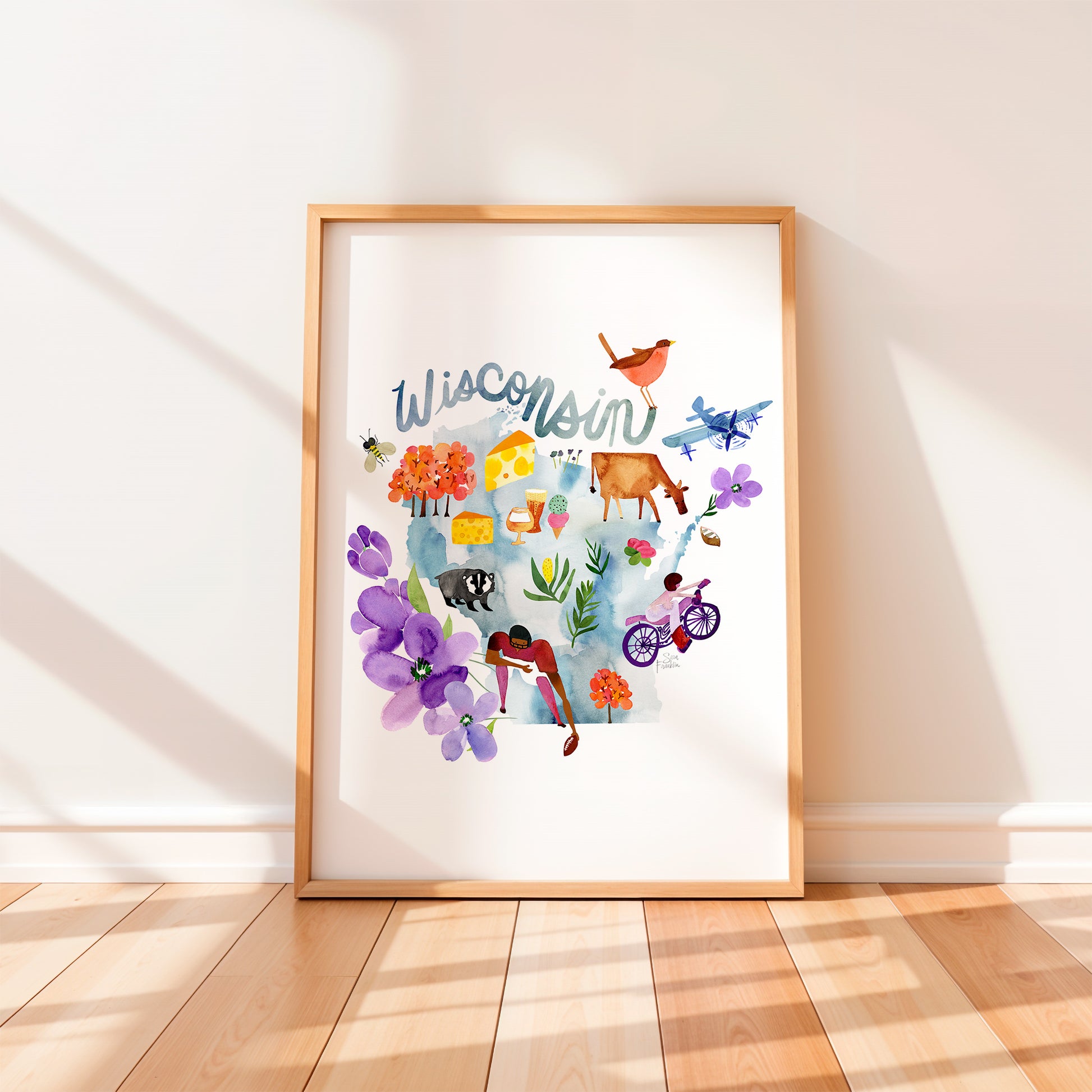 a picture frame with a picture of animals on it