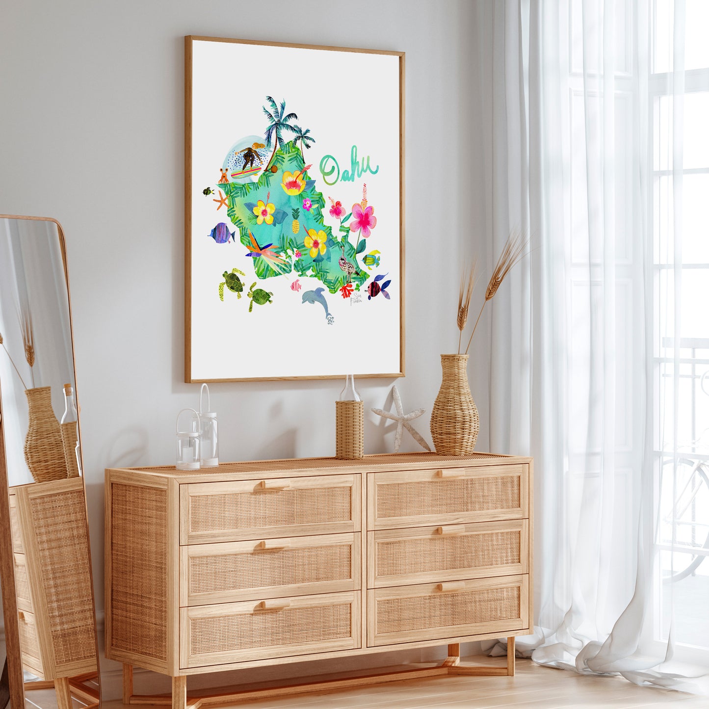 a picture hanging on a wall above a dresser