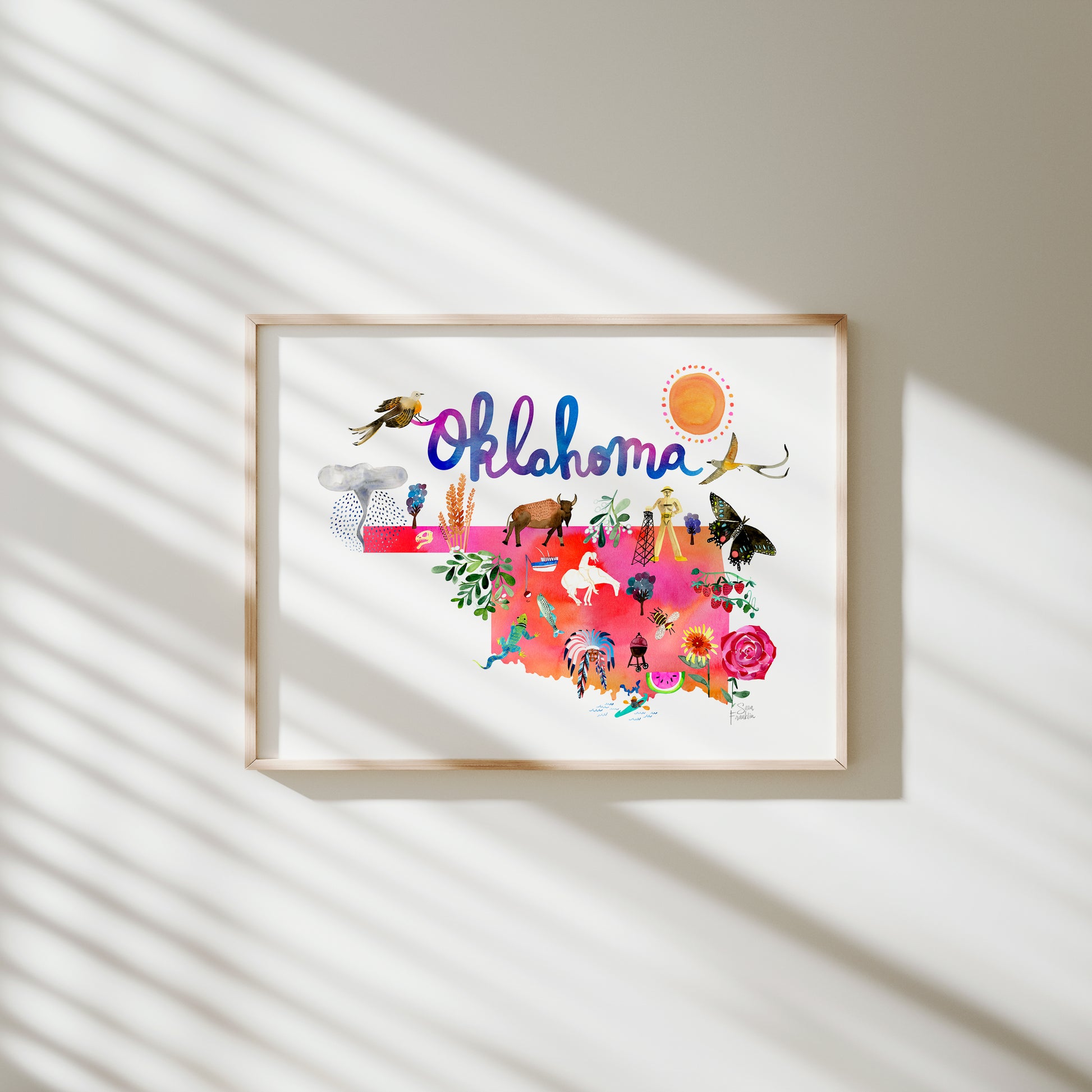 a picture hanging on a wall with the word oklahoma in it